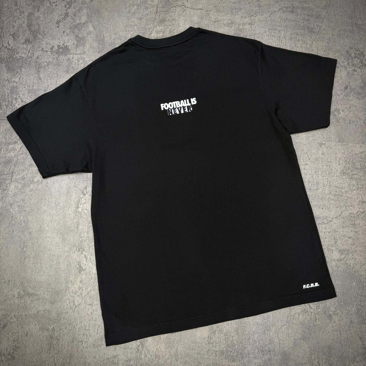 Back view of the Kojiro Hyuga x F.C.Real Bristol Emblem Tee showing the Football's Forever design.