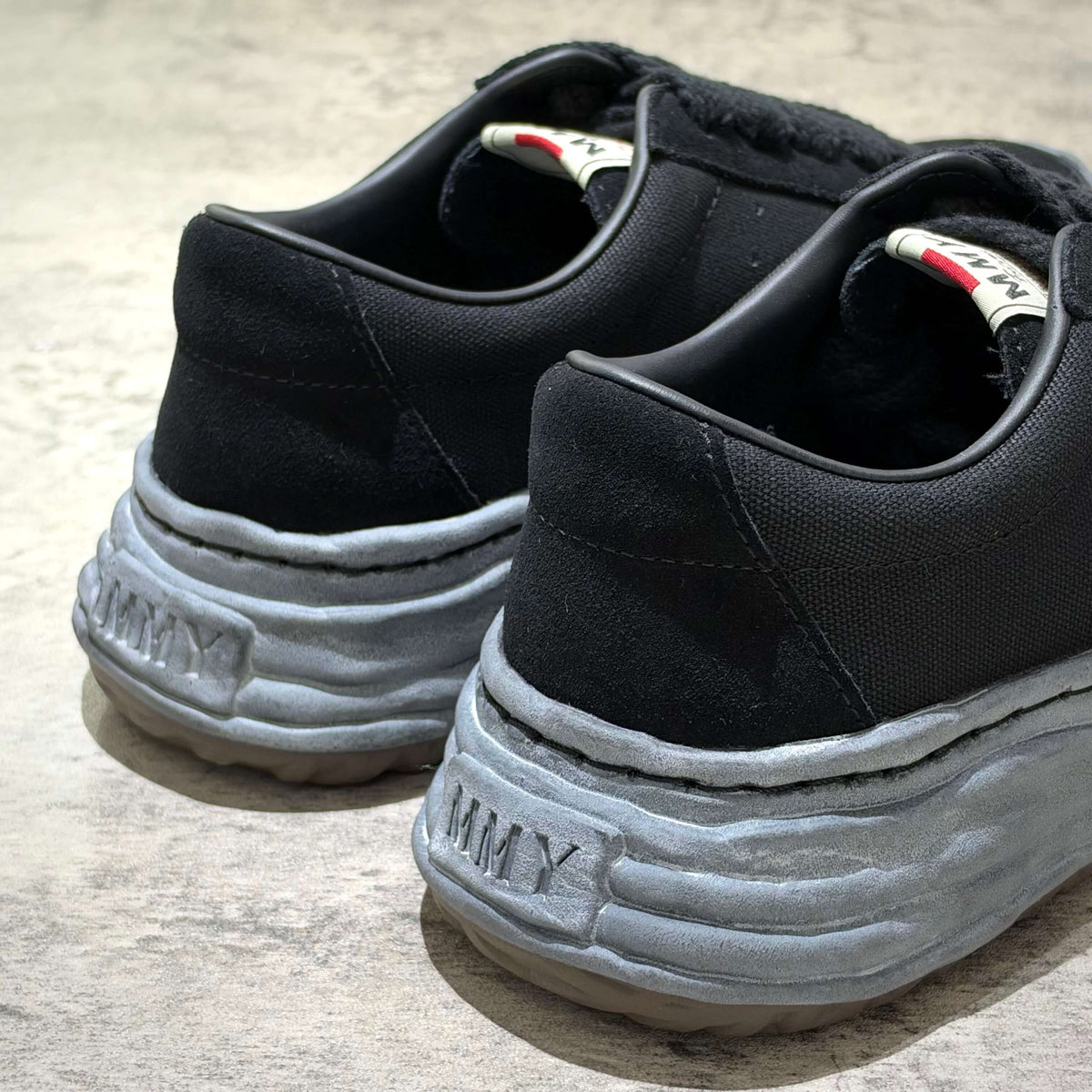 MMY Eric Overdyed Canvas - All Black sneaker detail, featuring black upper and unique gray sole, SKU A17FW706B.