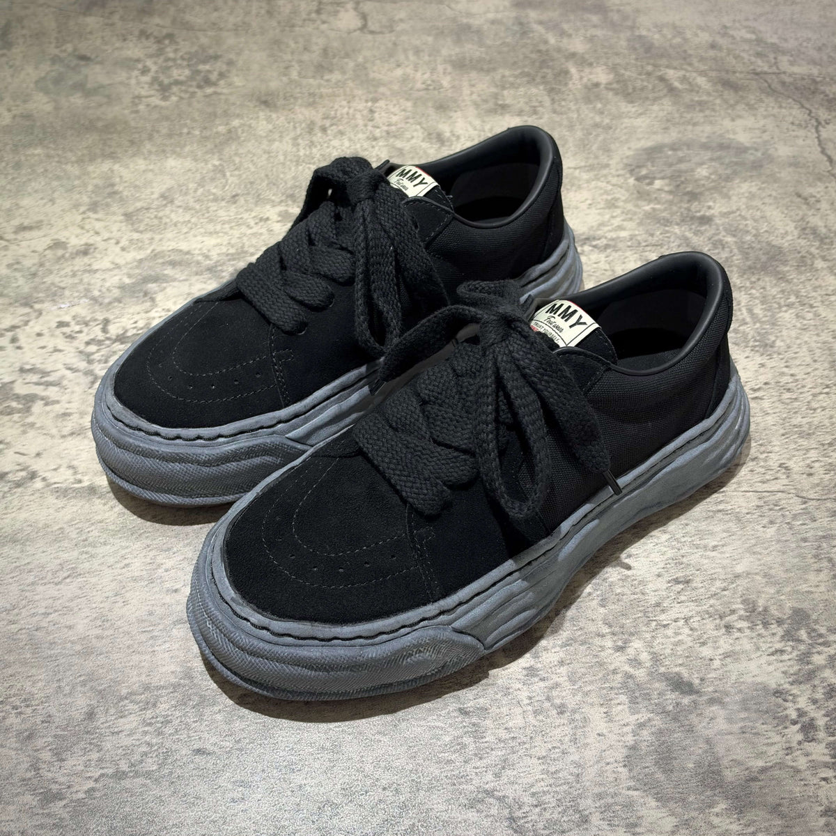 MMY Eric Overdyed Canvas - All Black A17FW706B sneakers with gray soles and laces, front view.