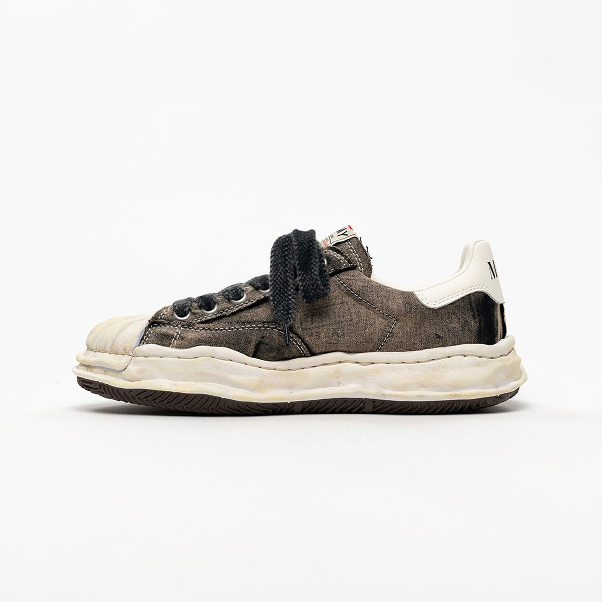MMY Blakey Bleached Canvas Low - Black A17FW731 side view of stylish bleached canvas sneakers with unique details.