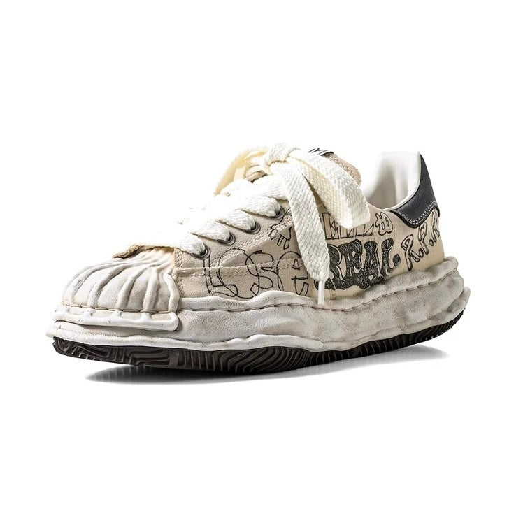 MMY BLAKEY Graffiti Printed Canvas Low sneaker featuring unique graffiti designs and a comfortable sole.