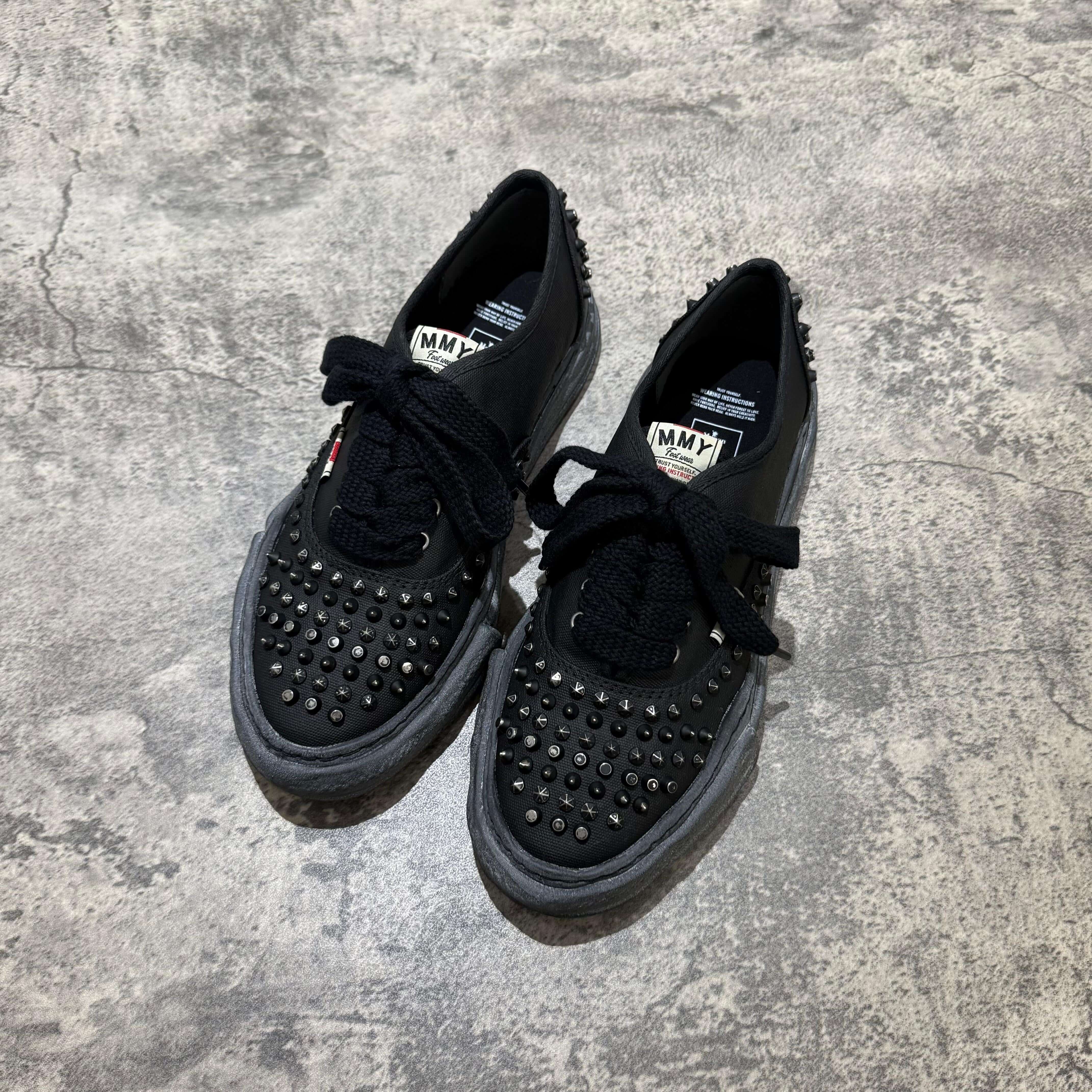 MMY Baker Studded Canvas Low - All Black, stylish oversized sneakers with studded detailing and black laces.