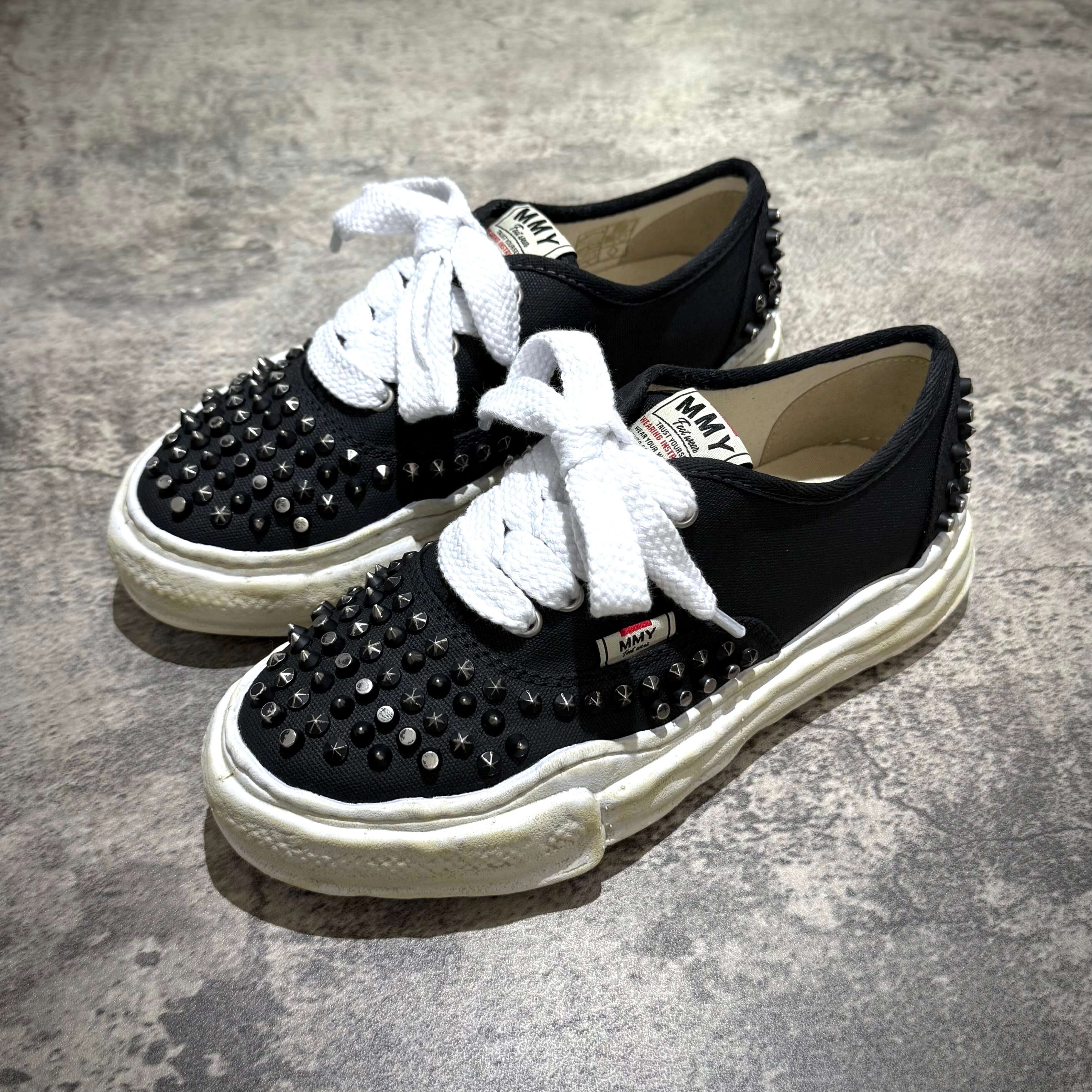 MMY Baker Studded Canvas Low - Black/White with spikes and white laces, featuring MMY PETERSON OG Canvas - Natural.