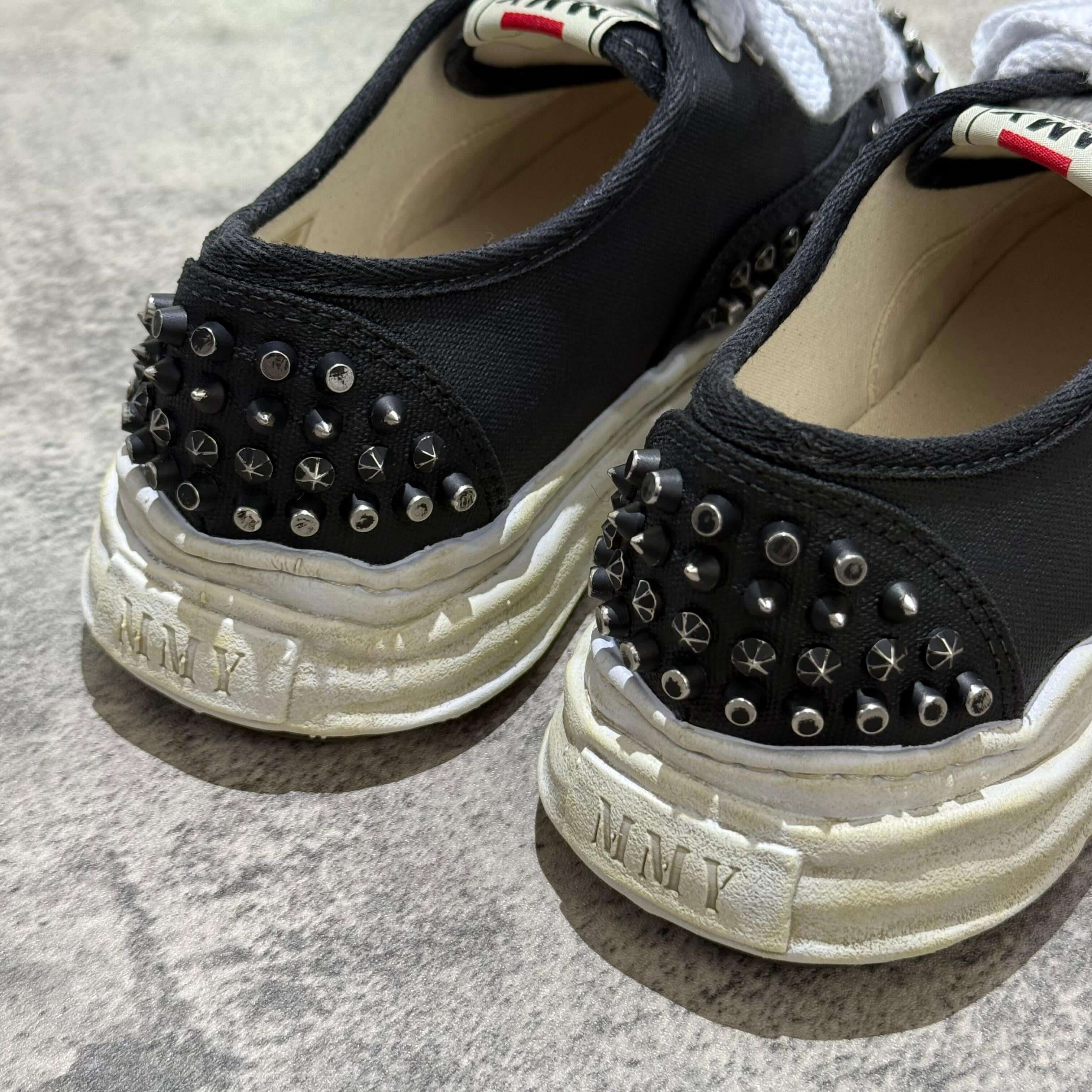 MMY Baker Studded Canvas Low - Black/White showing detailed studs on black canvas with white sole