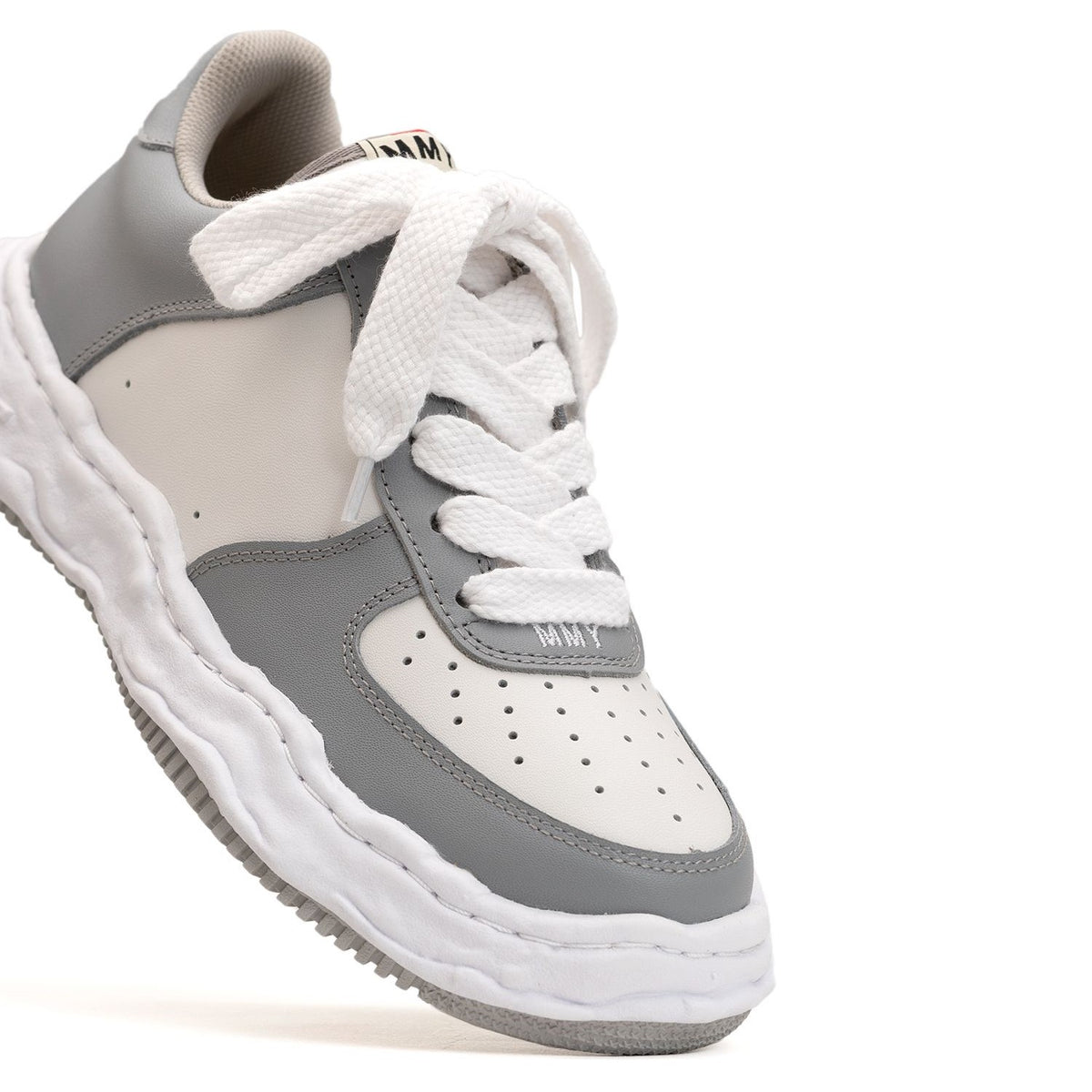 MMY WAYNE OG Leather - Grey sneaker featuring a grey and white design with laces.