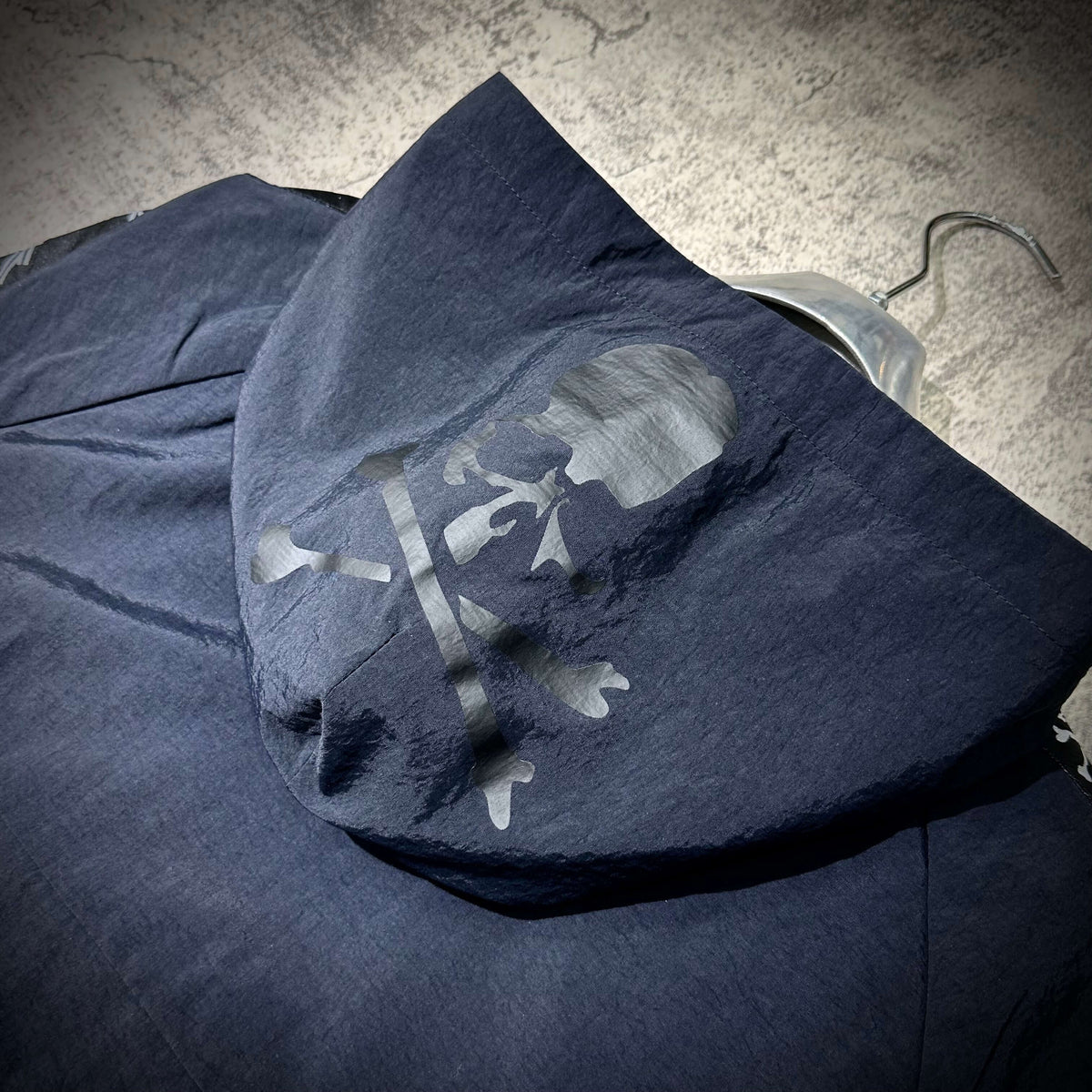 Mastermind Japan x Bonera Stretch Anthem Jacket featuring a skull graphic on the hood.