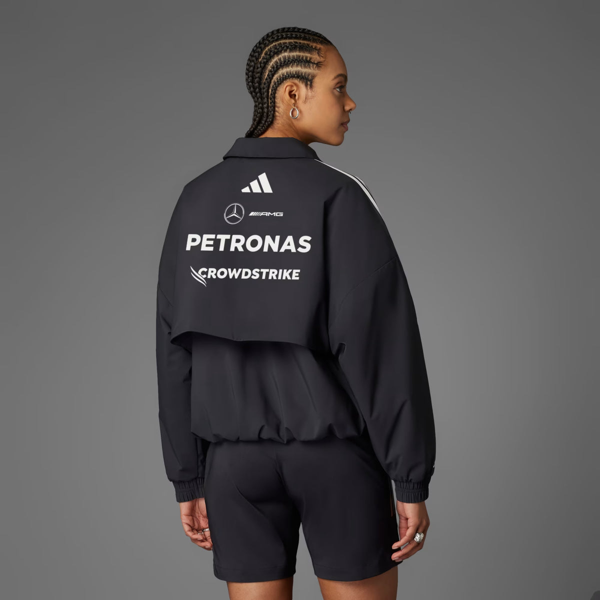 Adidas x Mercedes AMG Petronas 2025 F1 Team Jacket JX0751 (Women) back view, featuring team logos and stylish design.