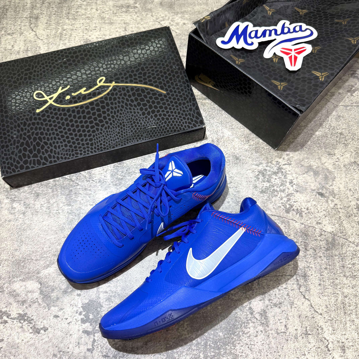 Nike Zoom Kobe 5 Protro Dodgers IO6256-400 shoes displayed with signature box and Mamba logo.