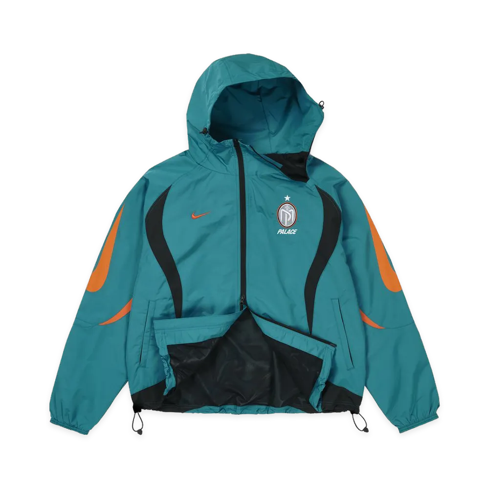 Palace x Nike Manor Place Jacket in teal with black and orange accents, featuring a hood and logo.