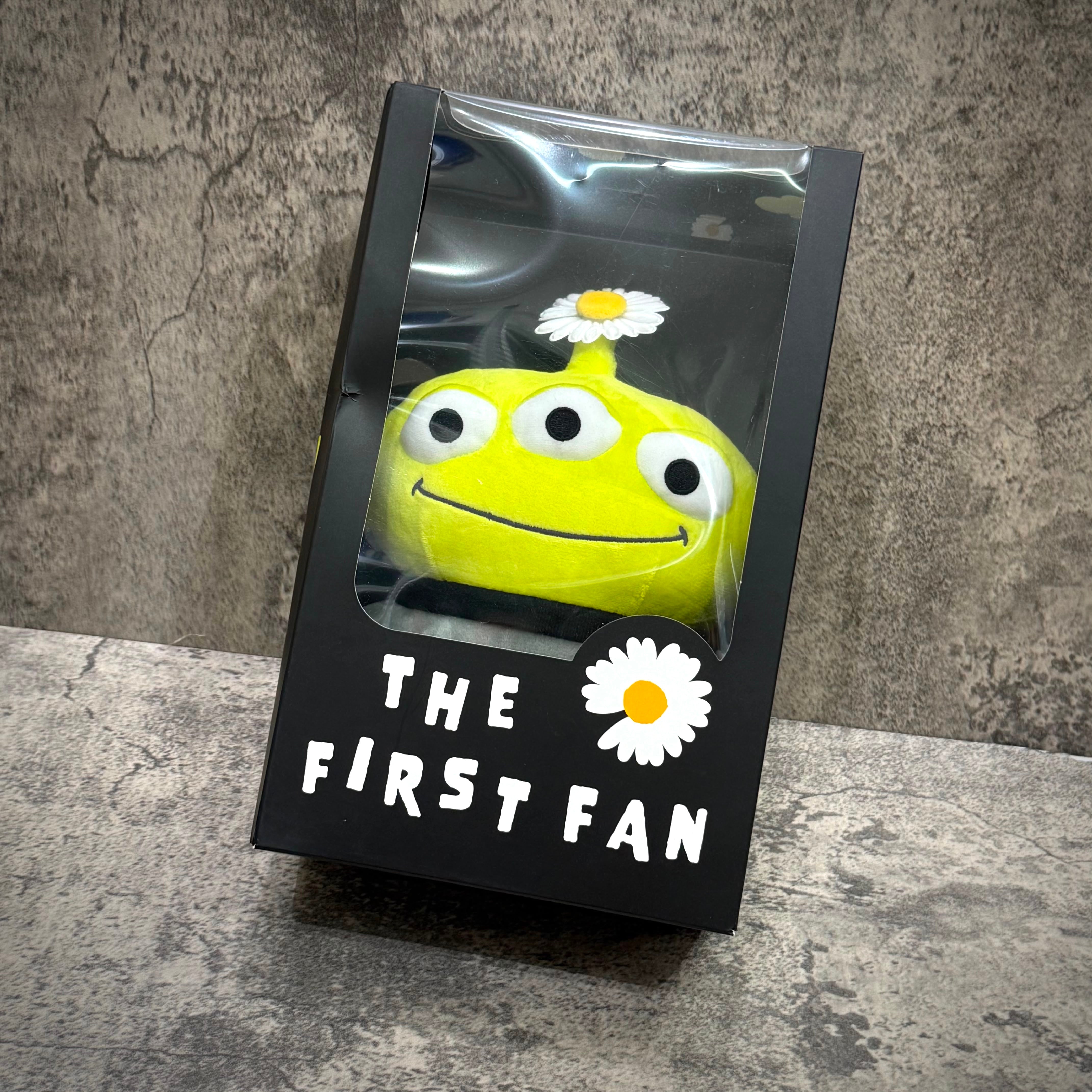 PEACEMINUSONE x Toy Story The First Fan - Alien Standing Plush in box with daisy design