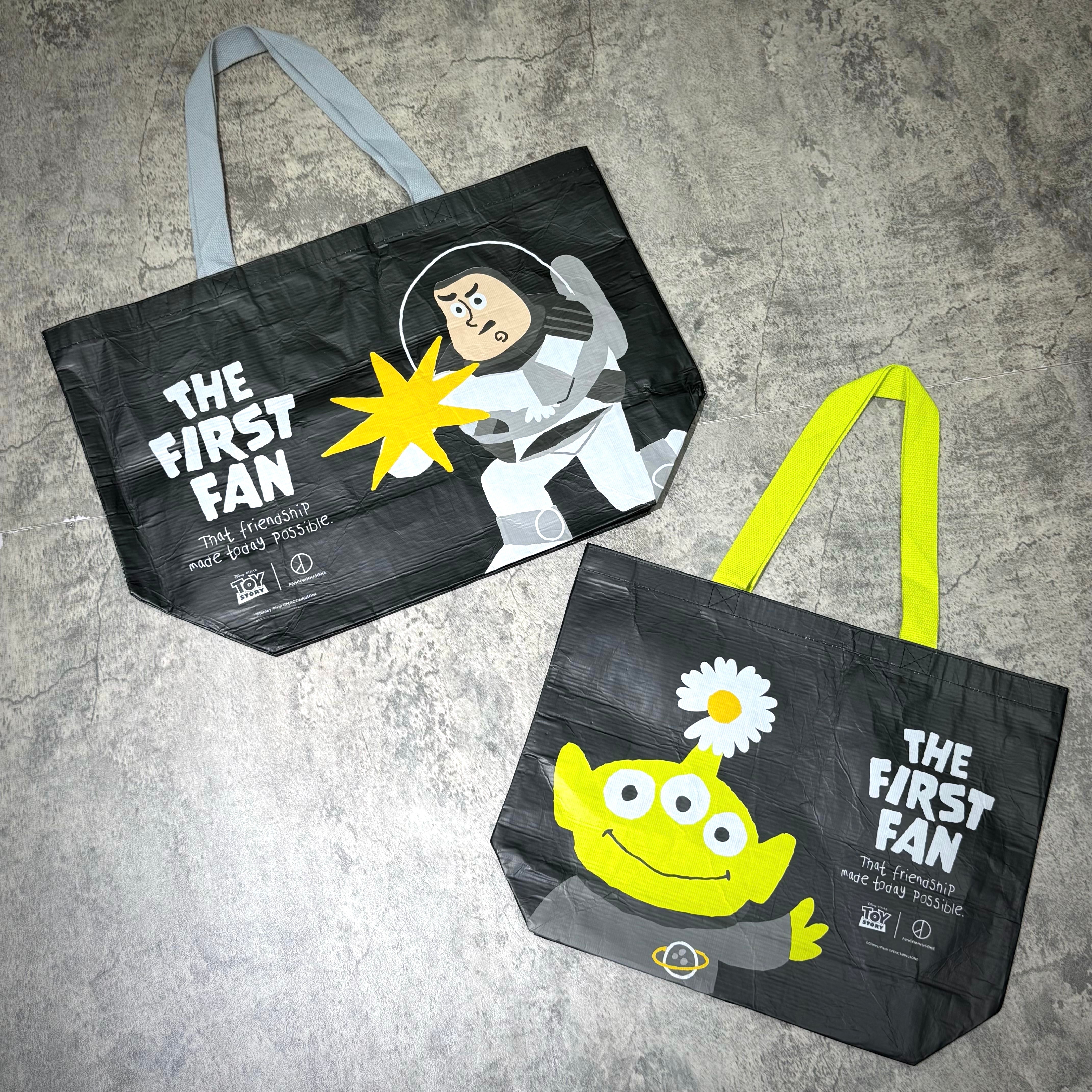 PEACEMINUSONE x Toy Story The First Fan - Reusable Bag featuring Buzz Lightyear and Alien character designs.