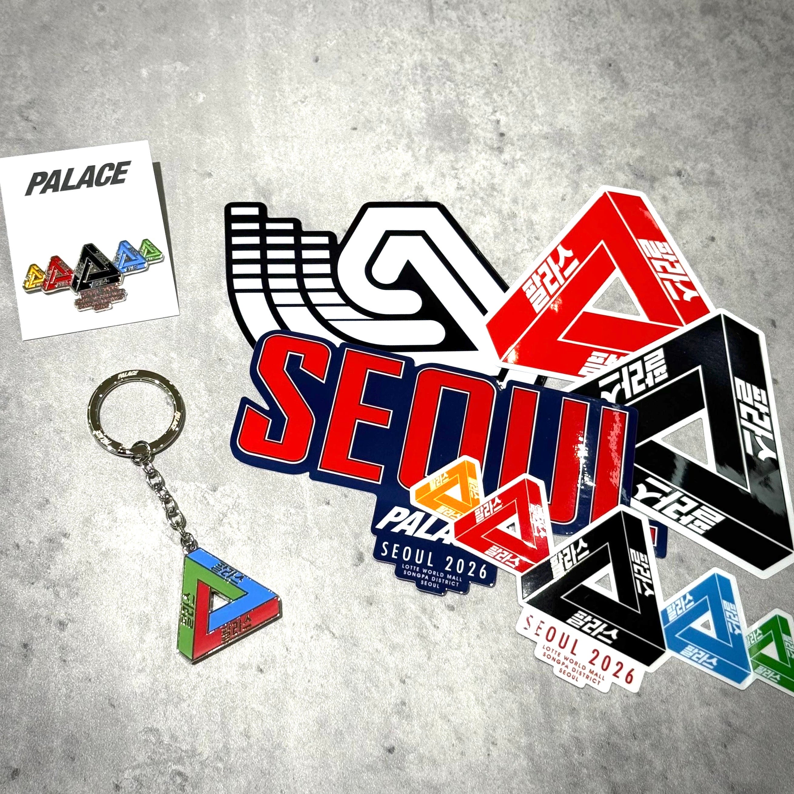 Palace Jamsil Exclusive Accessories featuring stickers and keychains in various colors.