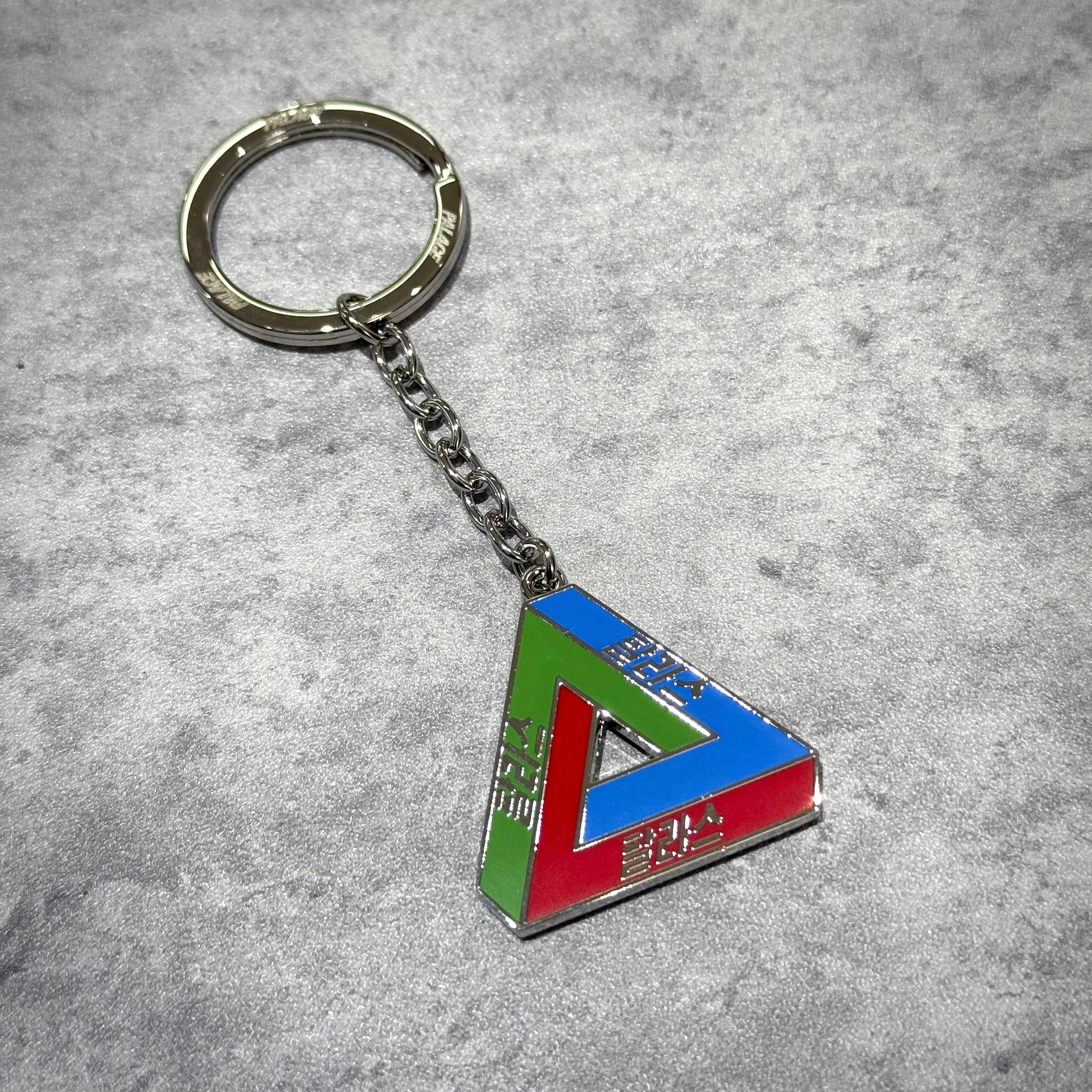 Palace Jamsil Exclusive Accessories keychain in colorful triangle design, perfect for accessorizing.