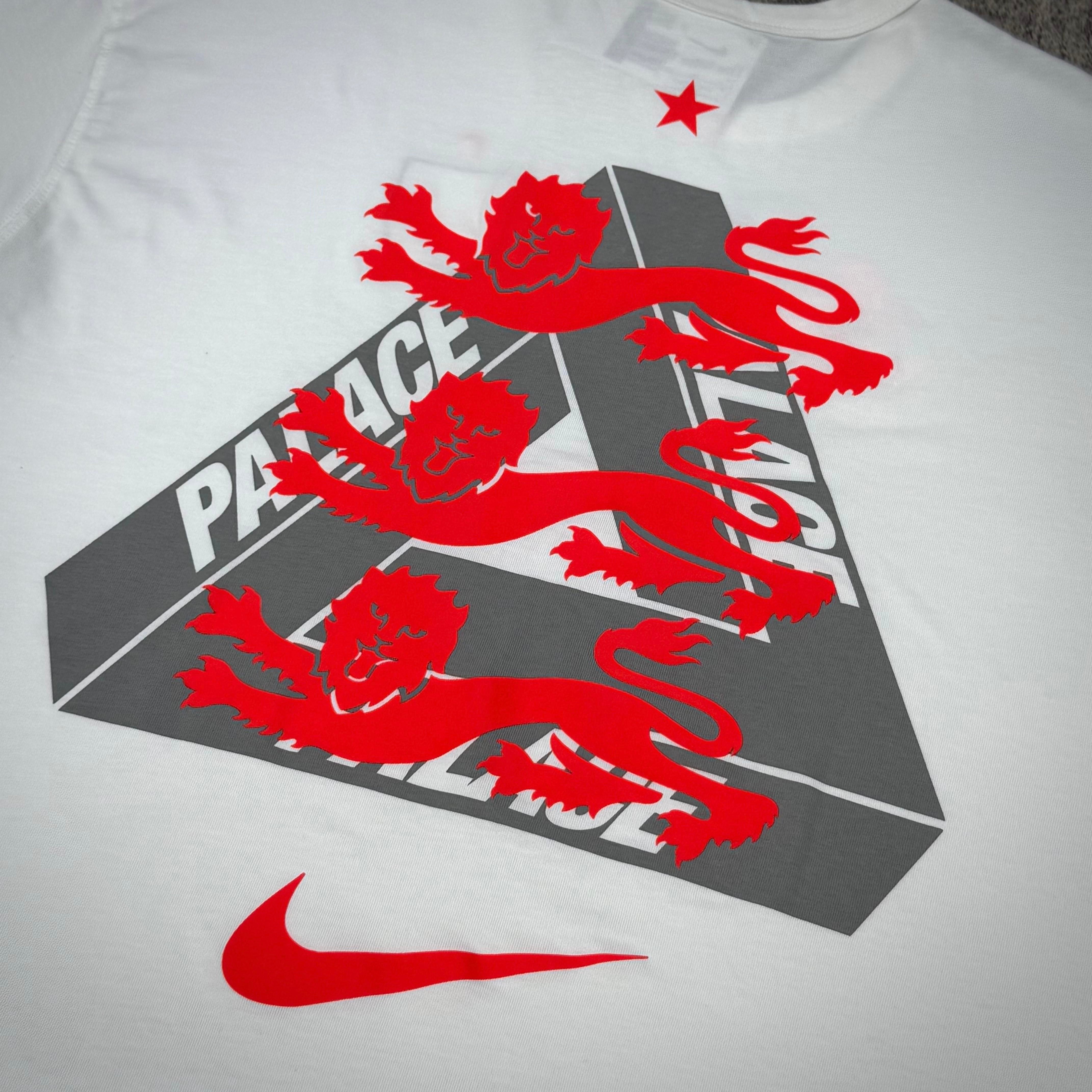 Palace x Nike England Tee featuring red lions and logo design on a white background.