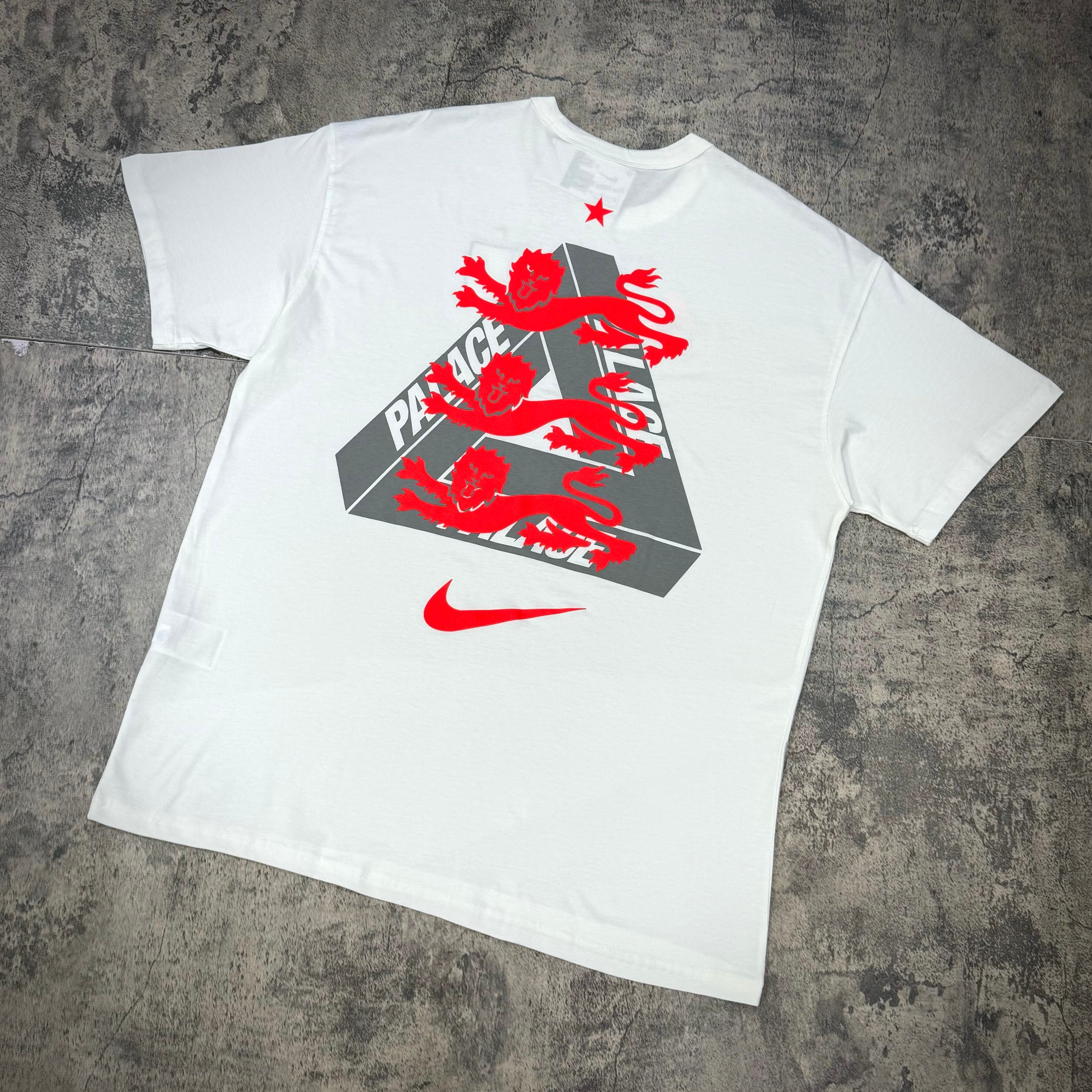 Palace x Nike England Tee featuring a graphic design of lions and the Nike logo on a white t-shirt background.