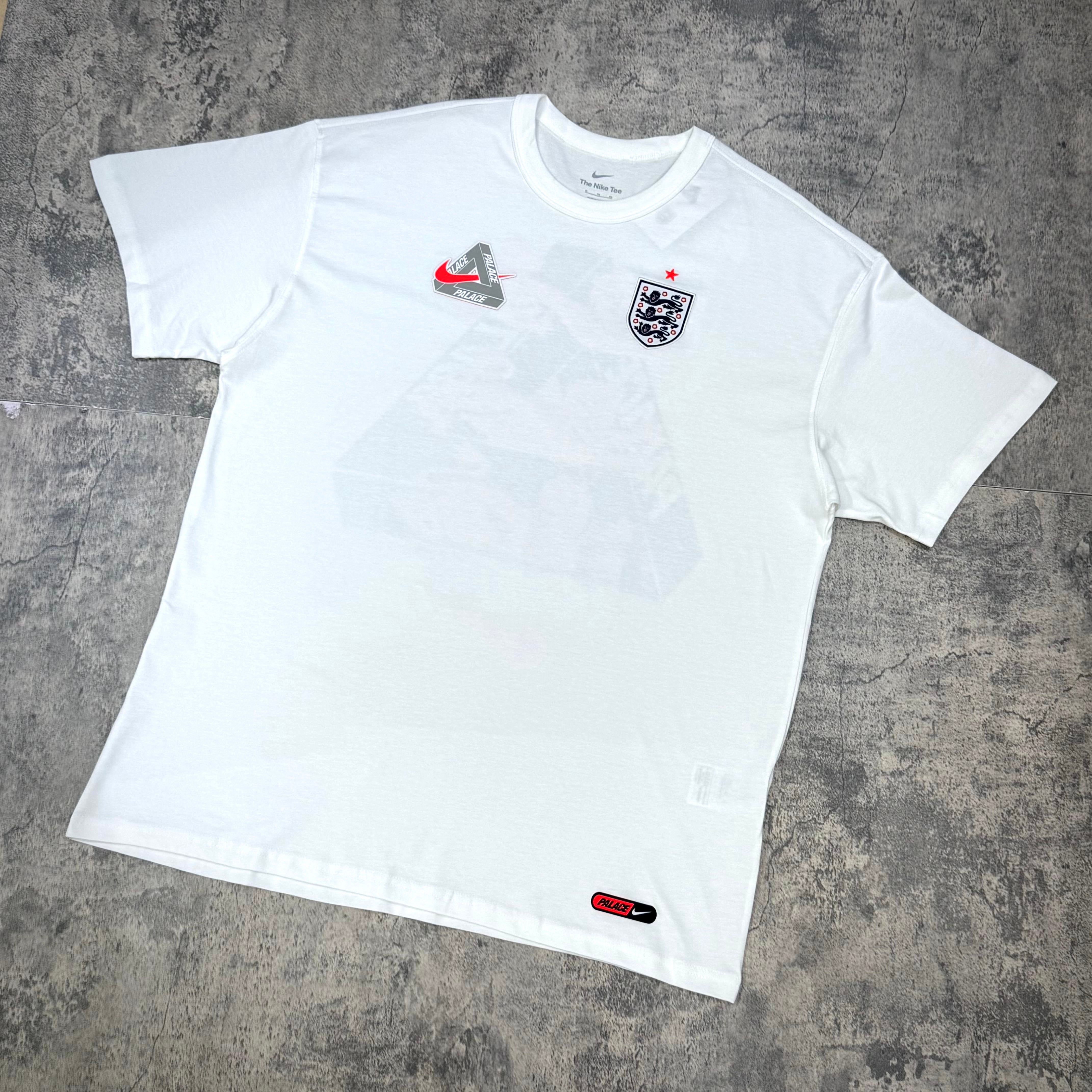 Palace x Nike England Tee featuring a white design and England crest, highlighting collaboration branding with Nike.