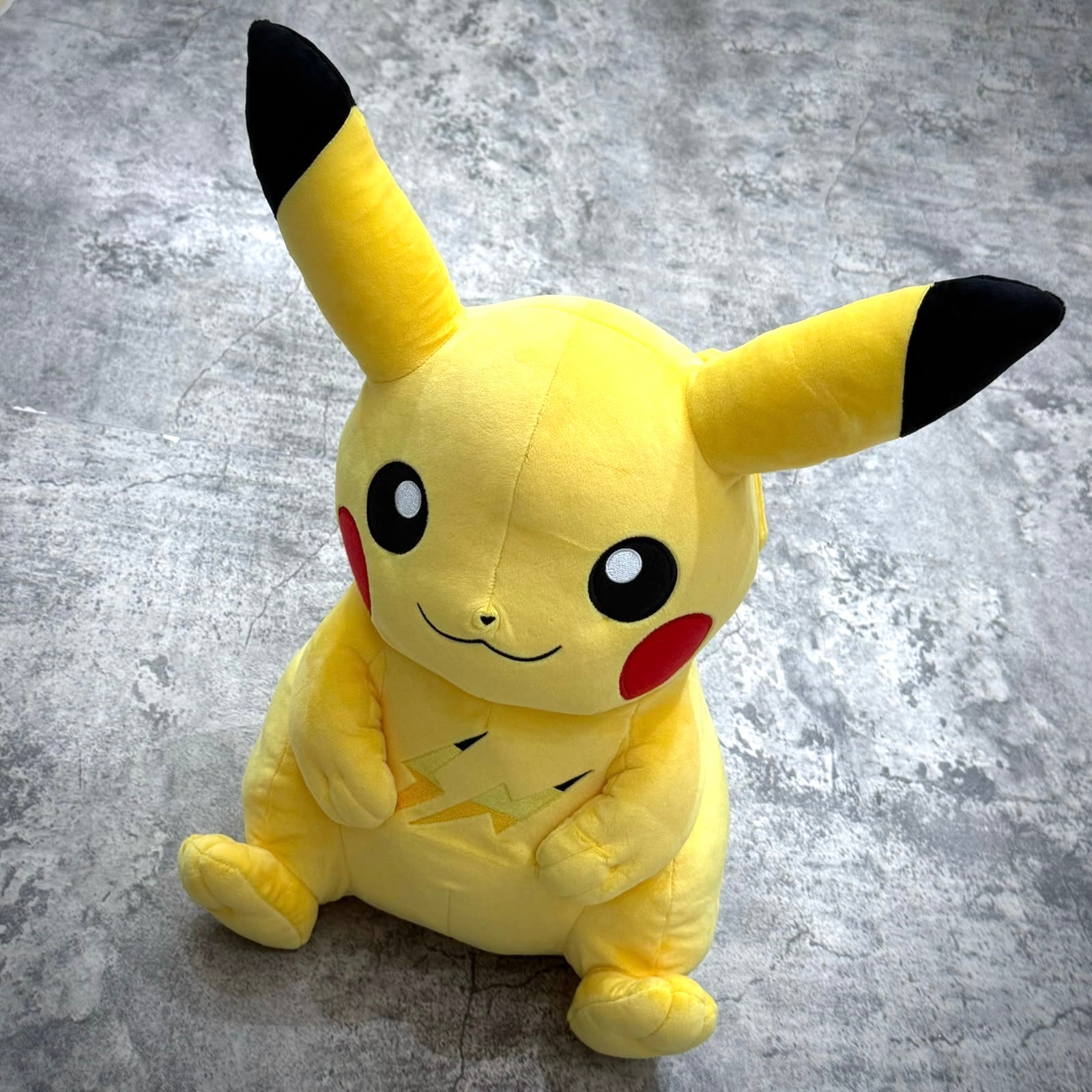 Pokemon x Thunderbolt Project by Fragment Pikachu Plush, a cute yellow plush toy with black-tipped ears.