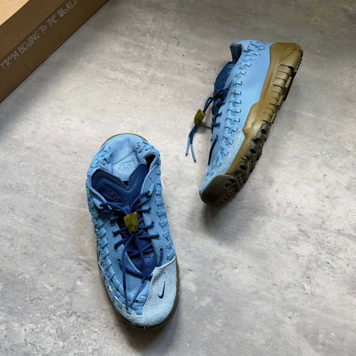 SOULGOODS x Nike Homescape Woven Blue Beyond HM6961-400 shoes in blue colorway, showcasing unique design and textures.