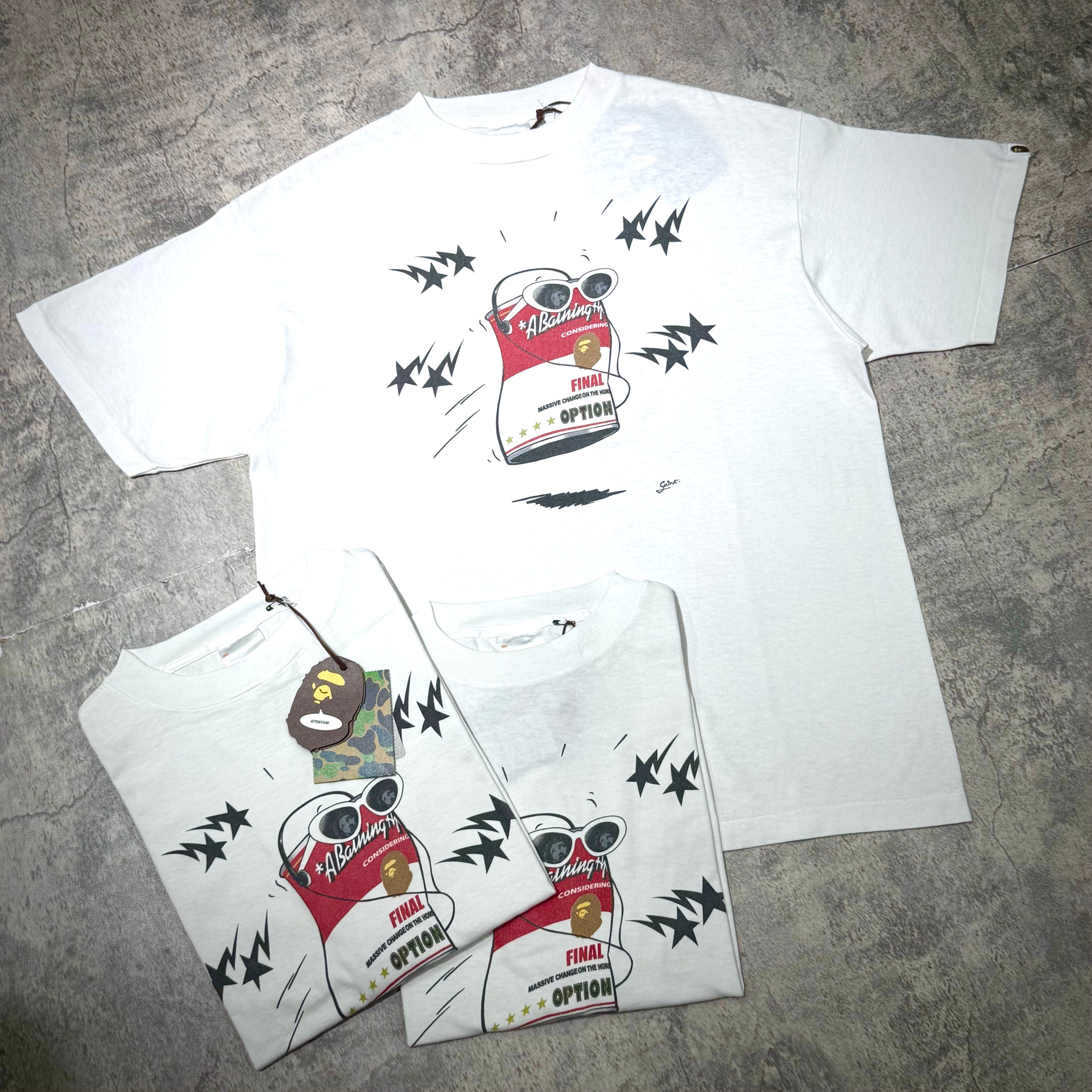 Saint Mxxxxxx BAPE Jump Tee featuring a graphic design on a white background, showcasing style and authenticity.