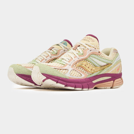 Saucony x Stan Birch ProGrid Guide 7 running shoes with pastel colors and unique design.
