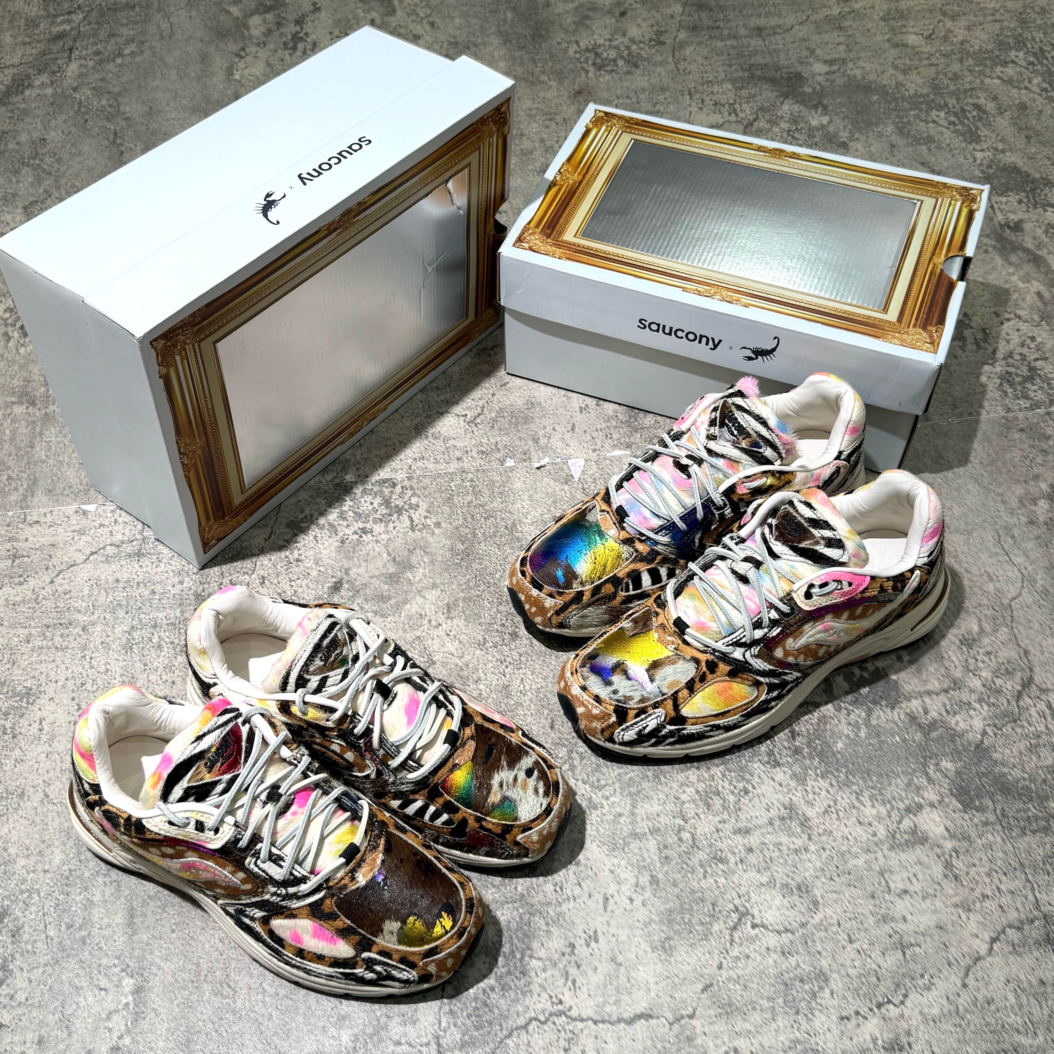 Saucony x Westside Gunn Grid Jazz 9 Awesome God shoes displayed with packaging on a textured surface. wear43way