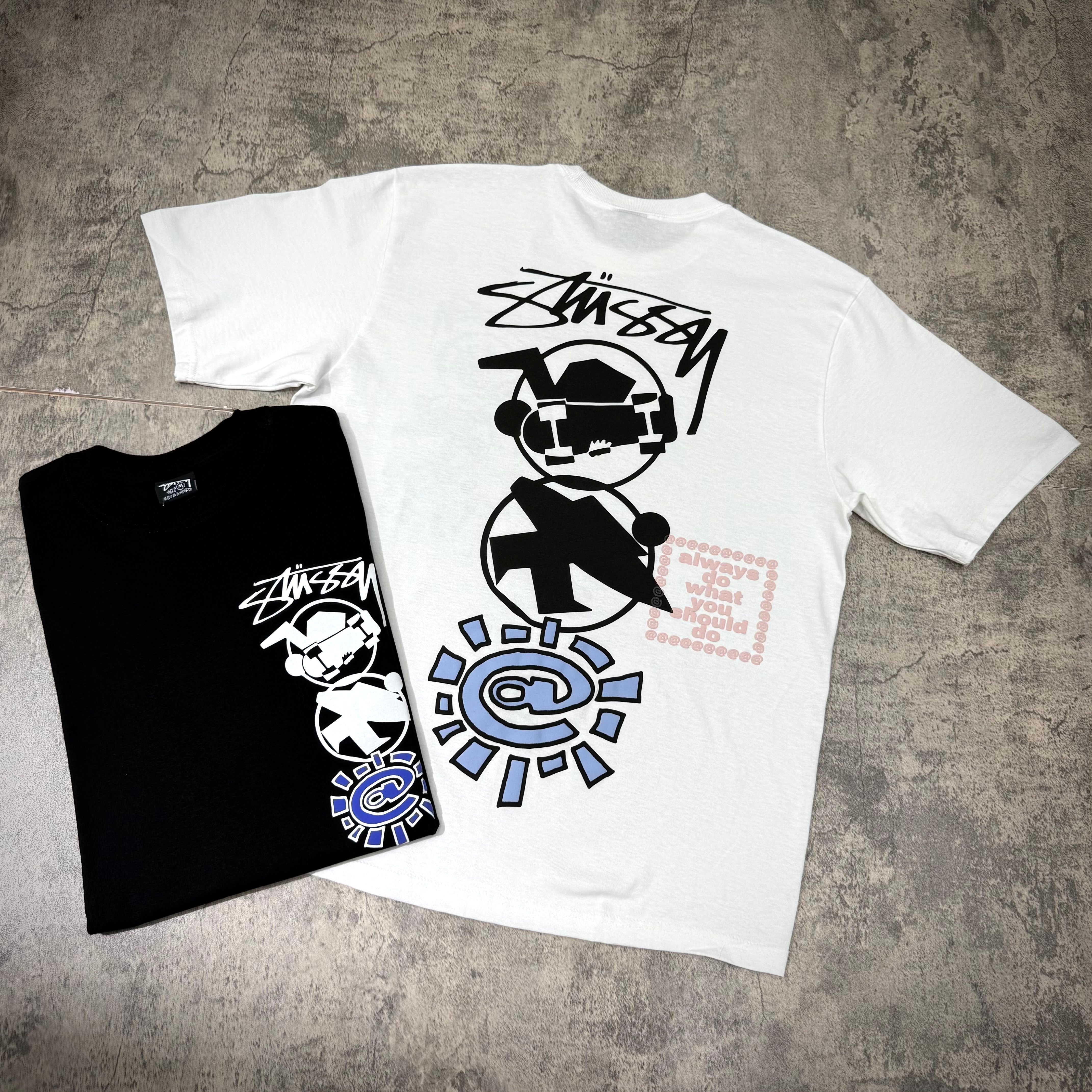 Stussy x Always Do What You Should Do Stack Tee, featuring unique graphic designs on black and white t-shirts.