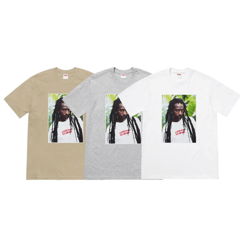 Supreme Buju Banton Tee featuring three color options: beige, gray, and white with a photo print.