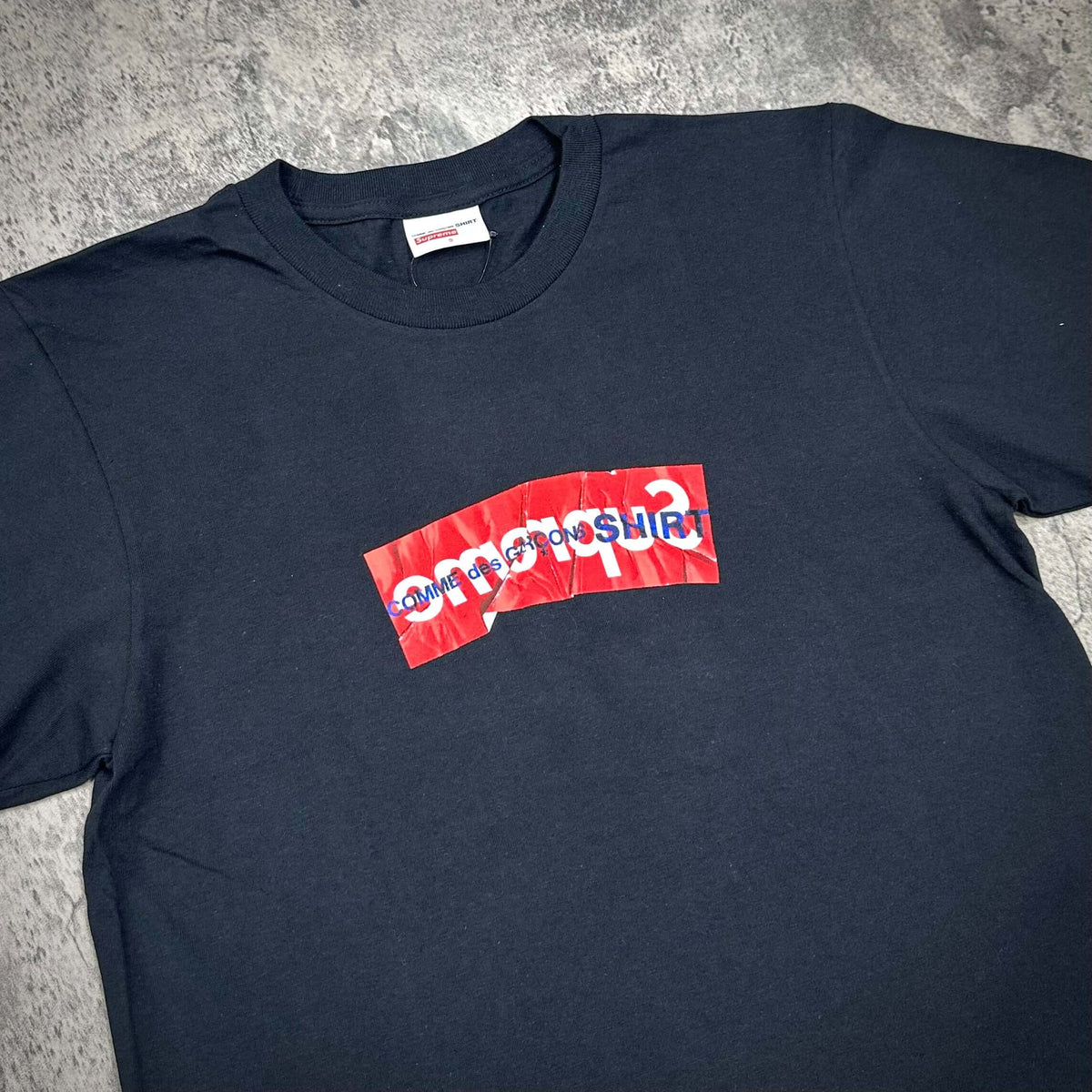 Supreme Comme Des Garcons SHIRT Box Logo Tee SS16 - Black, featuring a colorful box logo design on a black t-shirt.