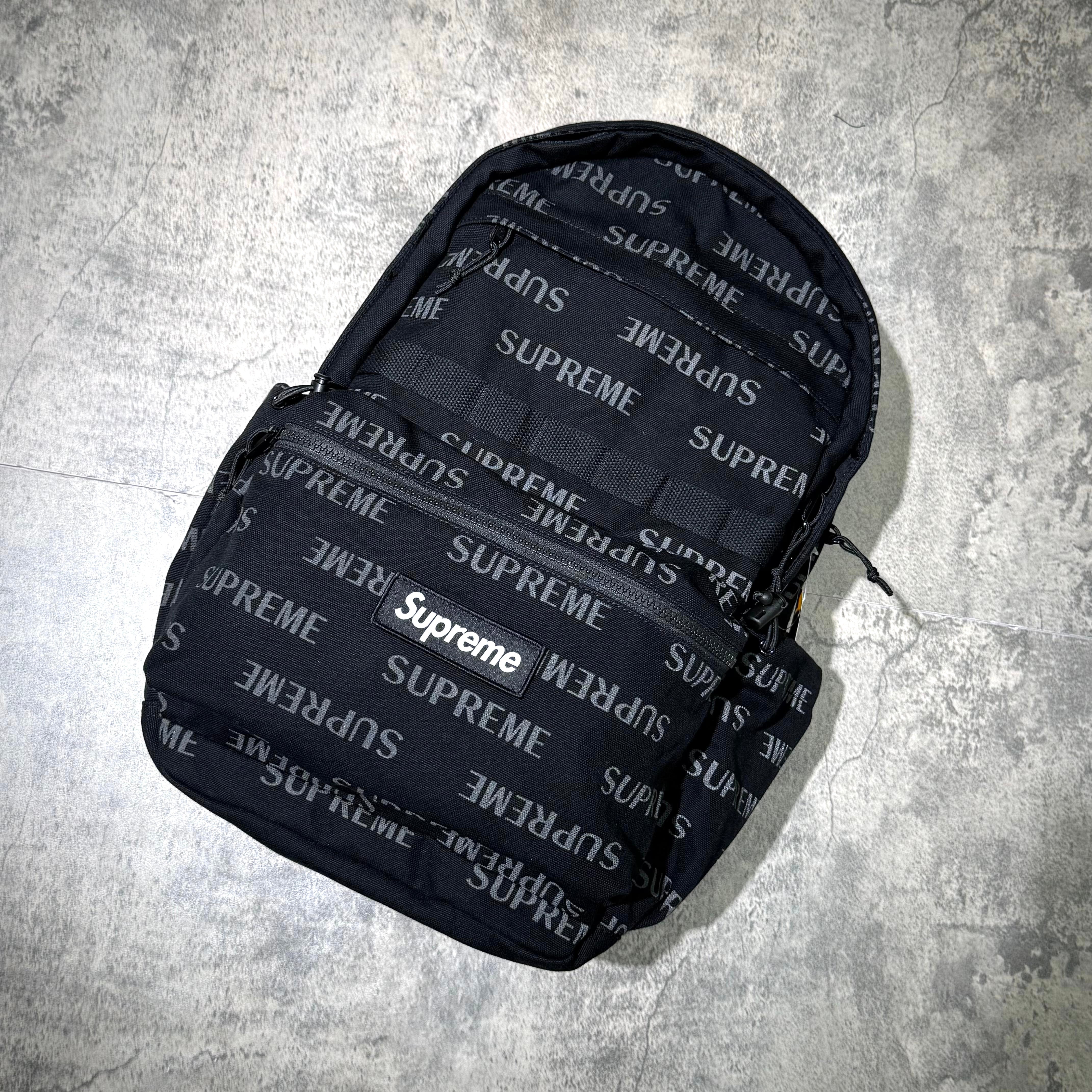 Supreme FW26 Backpack featuring an all-over black design with Supreme logo in white.