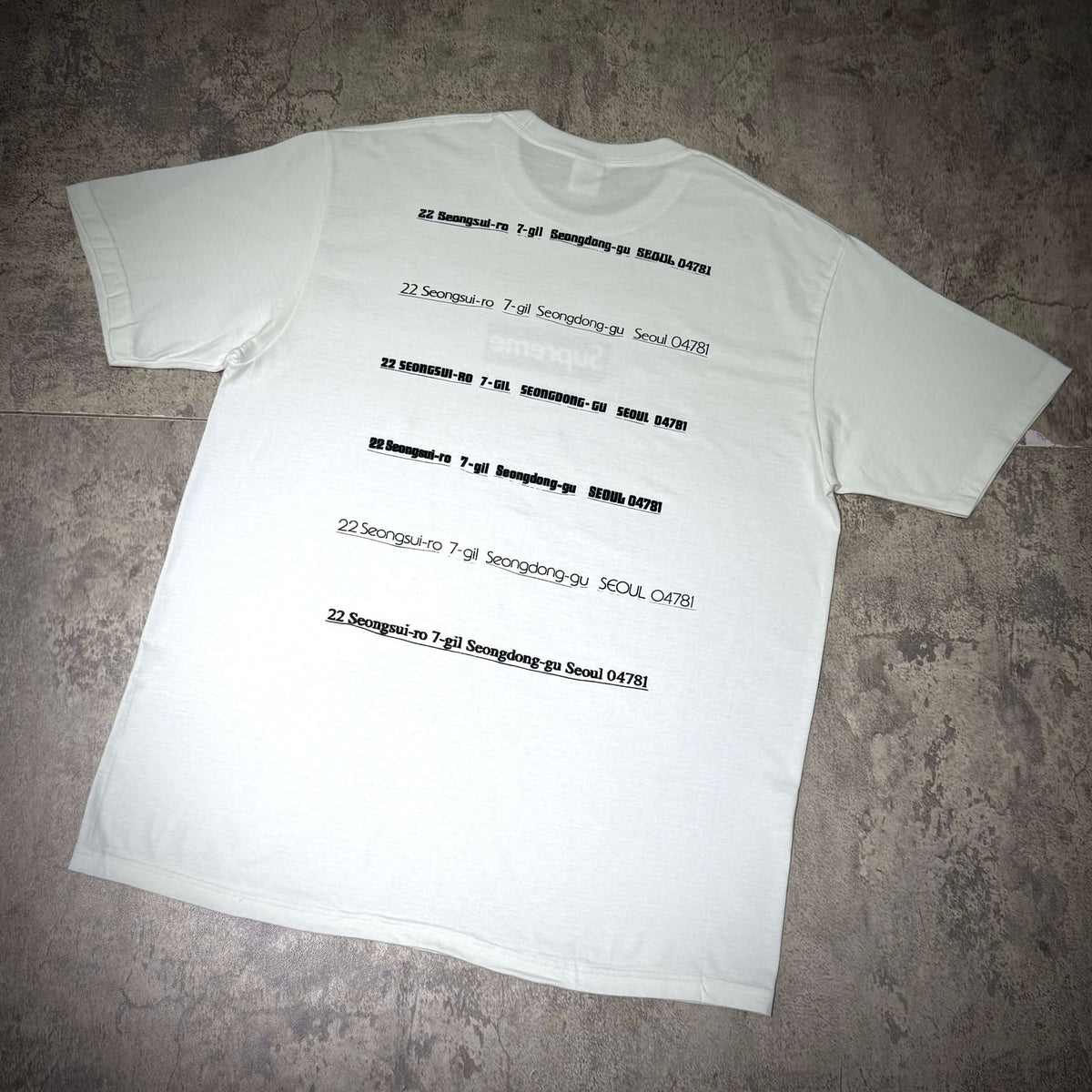 Supreme Seoul Box Logo Tee FW26 - White back design featuring text and graphics.