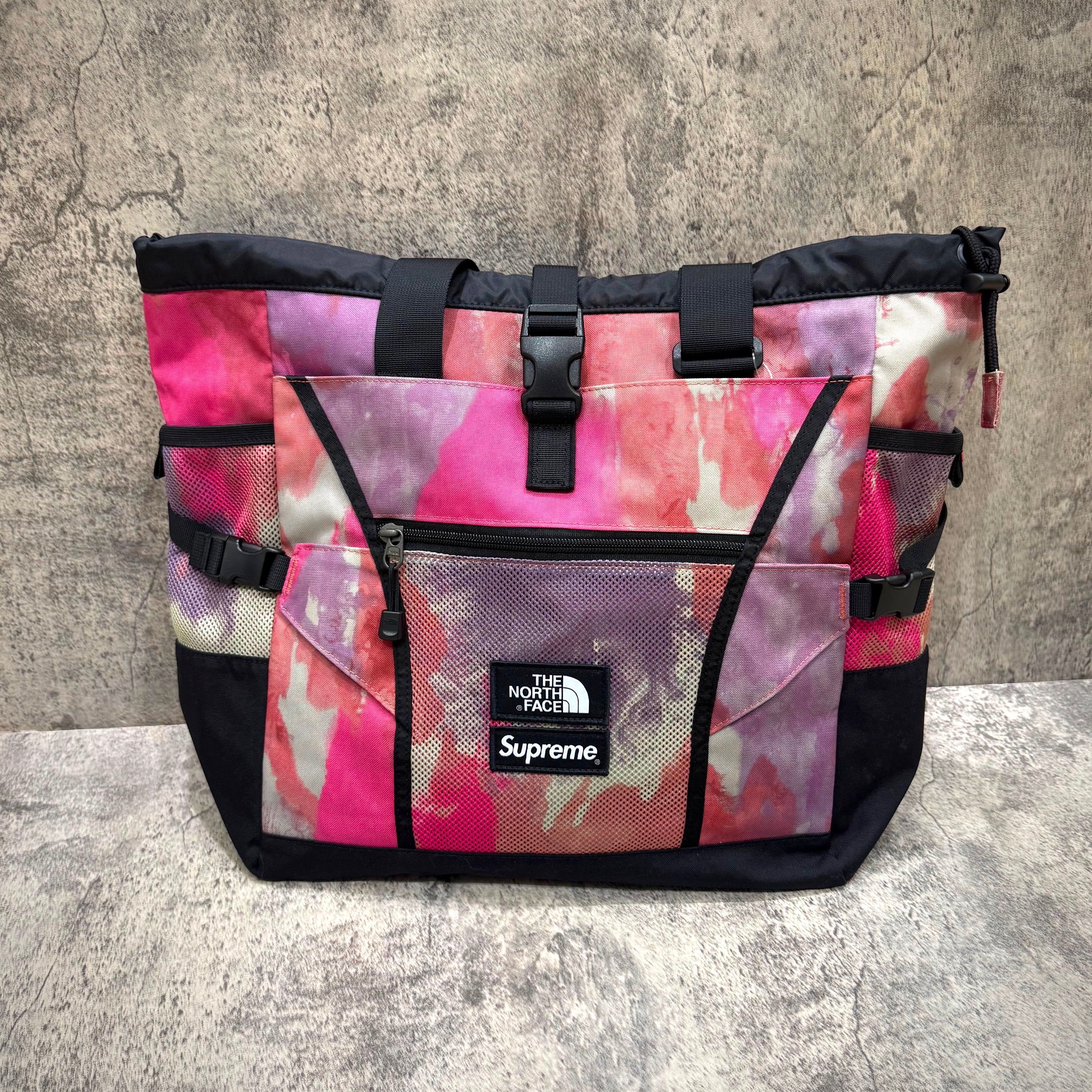 Supreme x The North Face Adventure Tote - Multicolor bag with a vibrant pink and purple design.