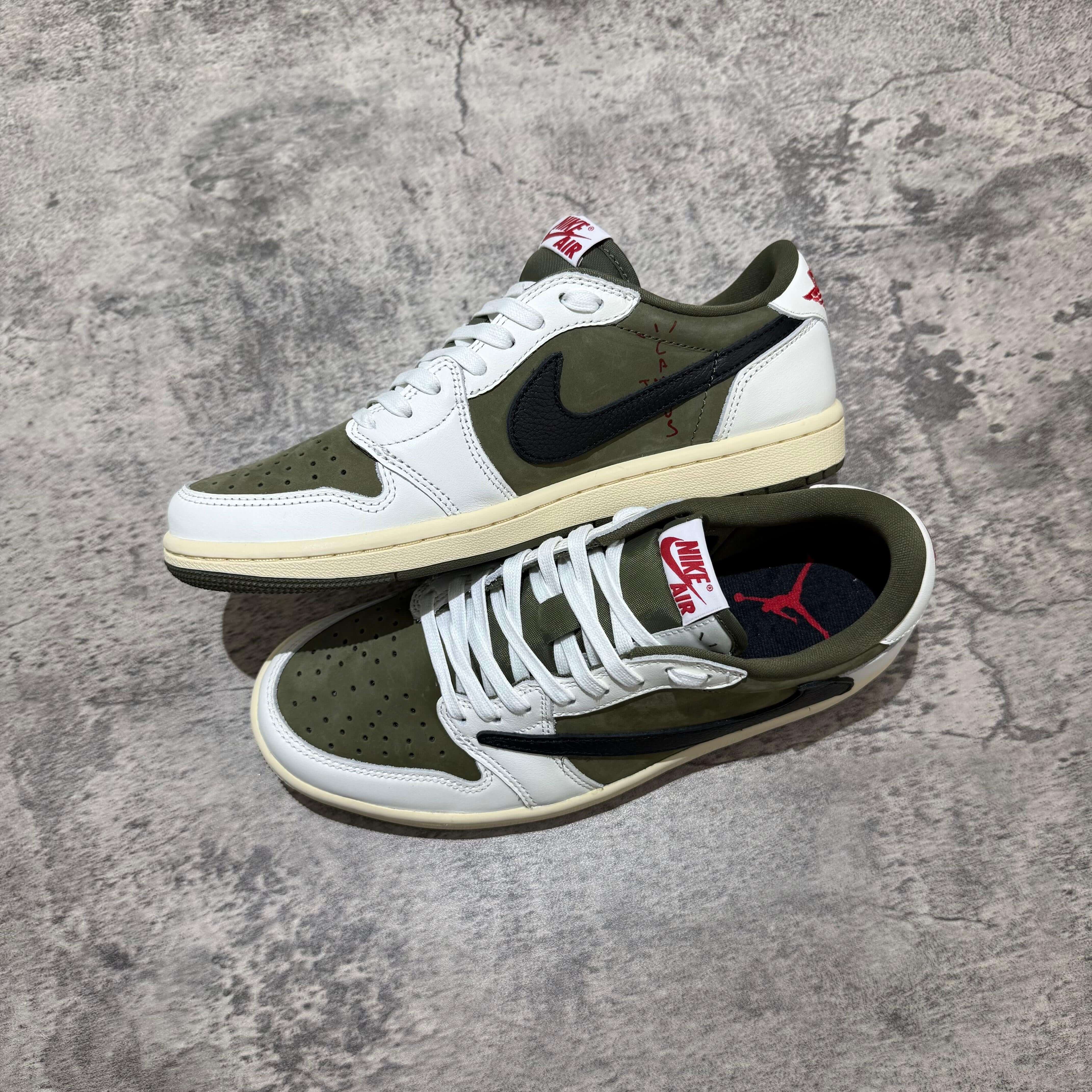 Travis Scott x Air Jordan 1 Low 8.0 Medium Olive sneakers with white and olive green colorway.