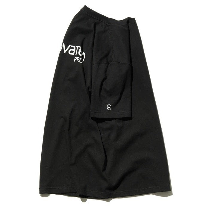 Artist Proof x Fragment x nonnative Innovaten Tee displayed on a flat surface, highlighting the unique black design.