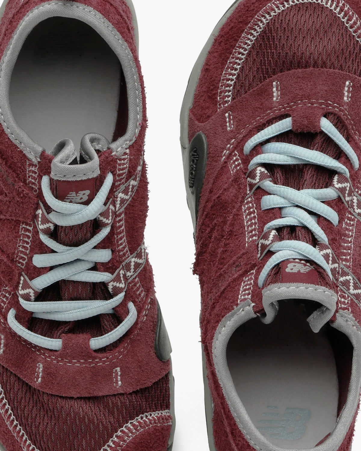 SUNLOVETOUR x New Blance MT1001ND top view of maroon shoes with gray and blue accents.