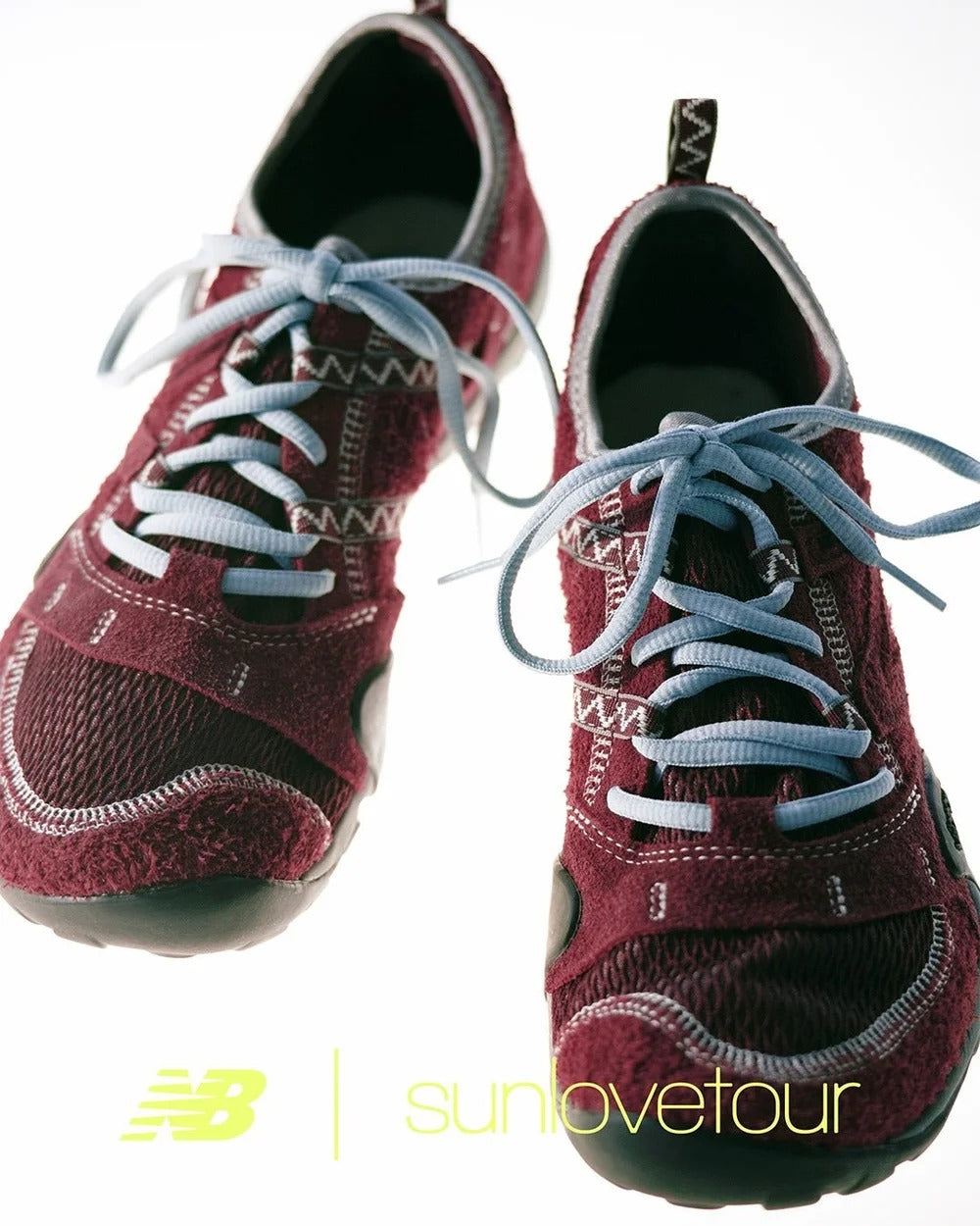 SUNLOVETOUR x New Blance MT1001ND shoes in burgundy with light blue laces, showing modern urban design.