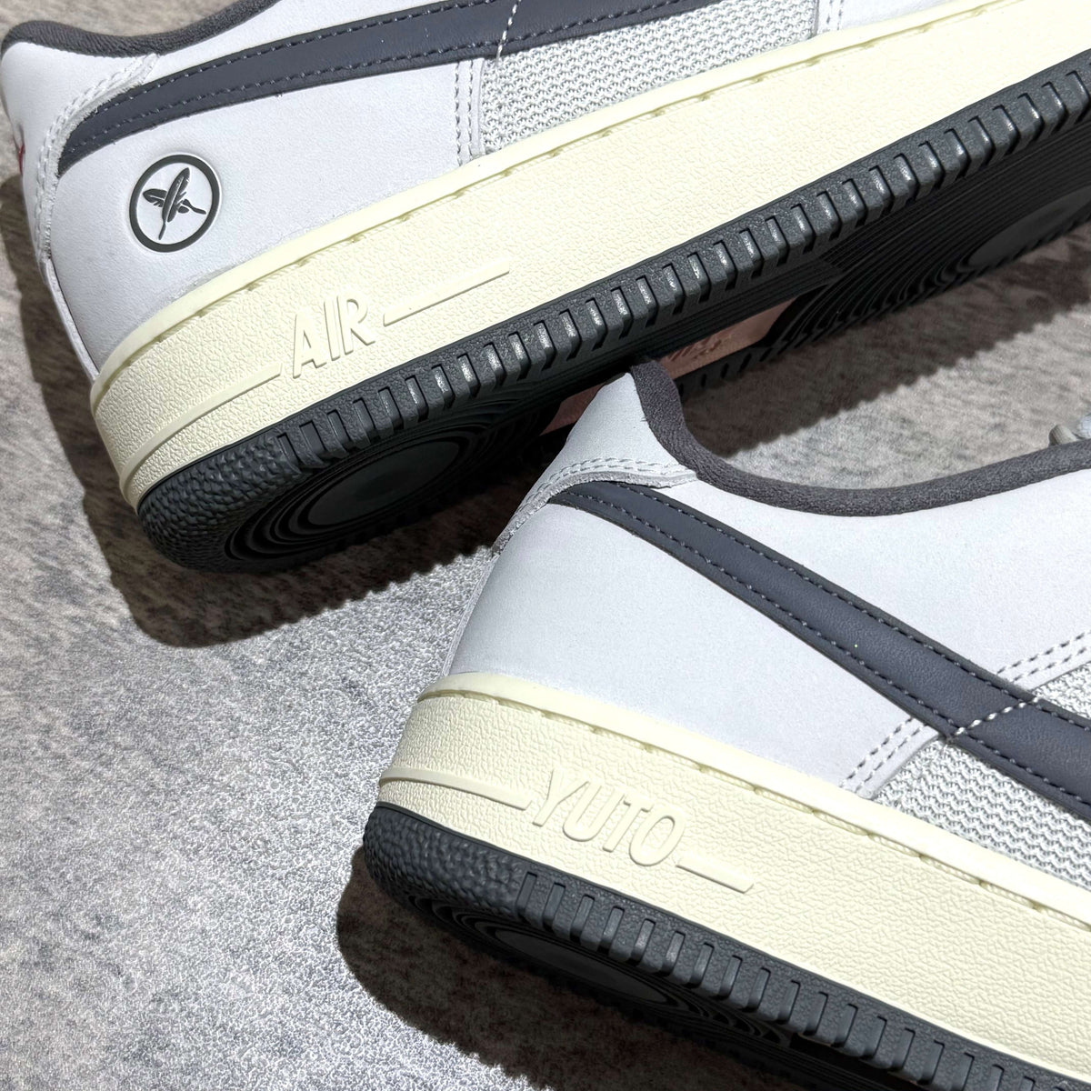 Yuto Horigome x Nike SB Air Force 1 Low IO8439-100 showcasing the distinctive heel design and logo.