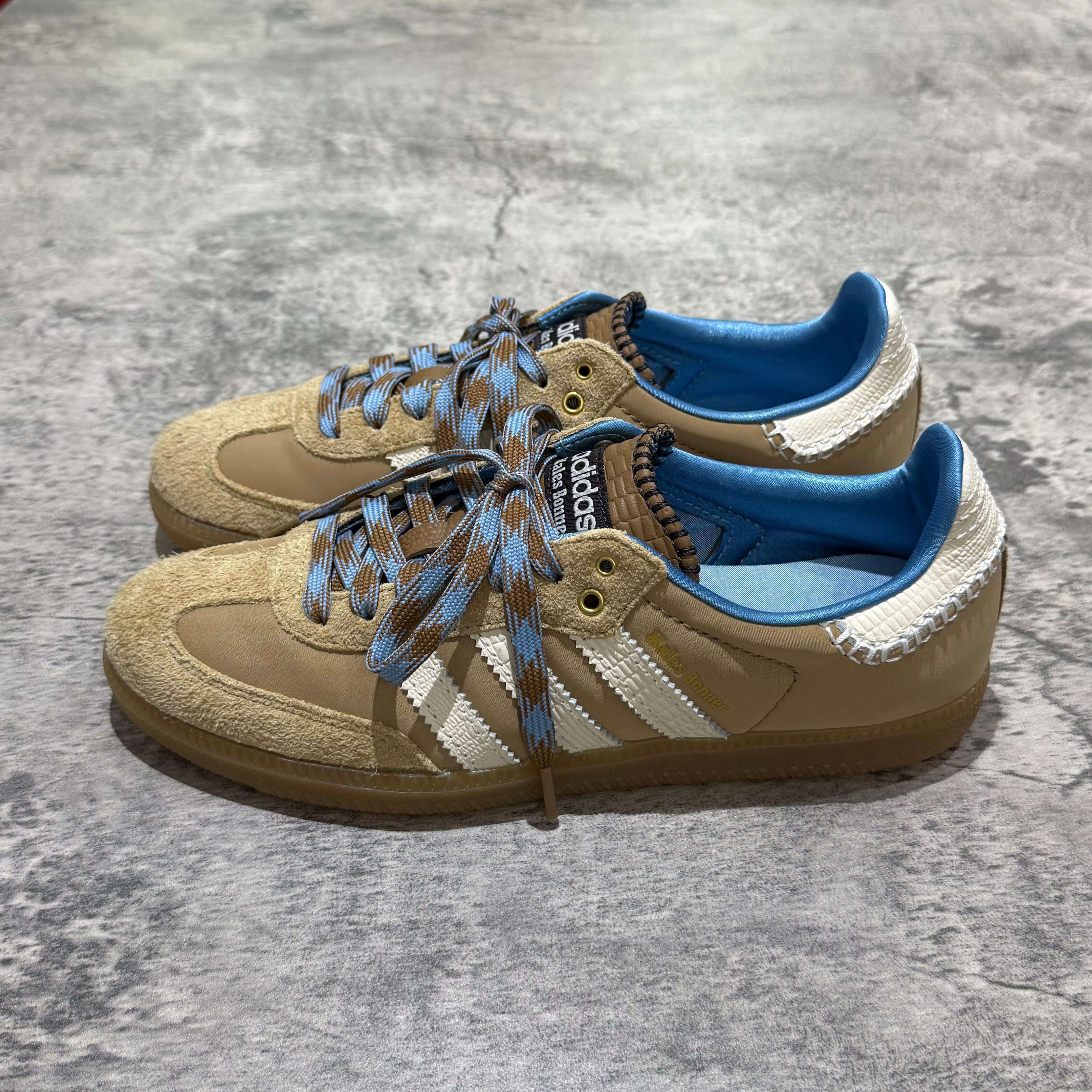 Wales Bonner x Adidas Originals Samba Nylon - Desert White sneakers in tan and blue design on a textured surface.