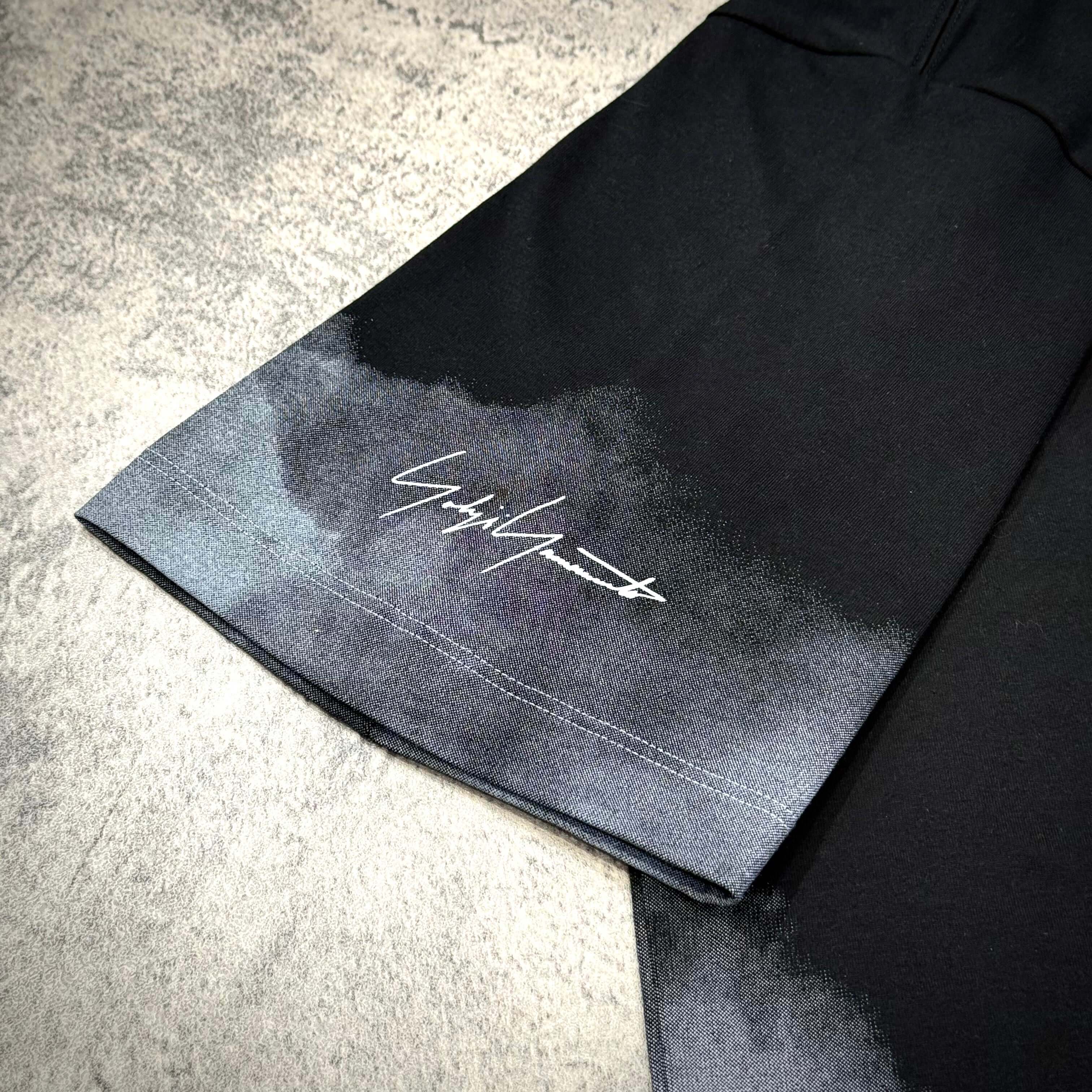 Y-3 x Mercedes AMG Petronas F1 Tour Tee cuff detail with signature and gradient design