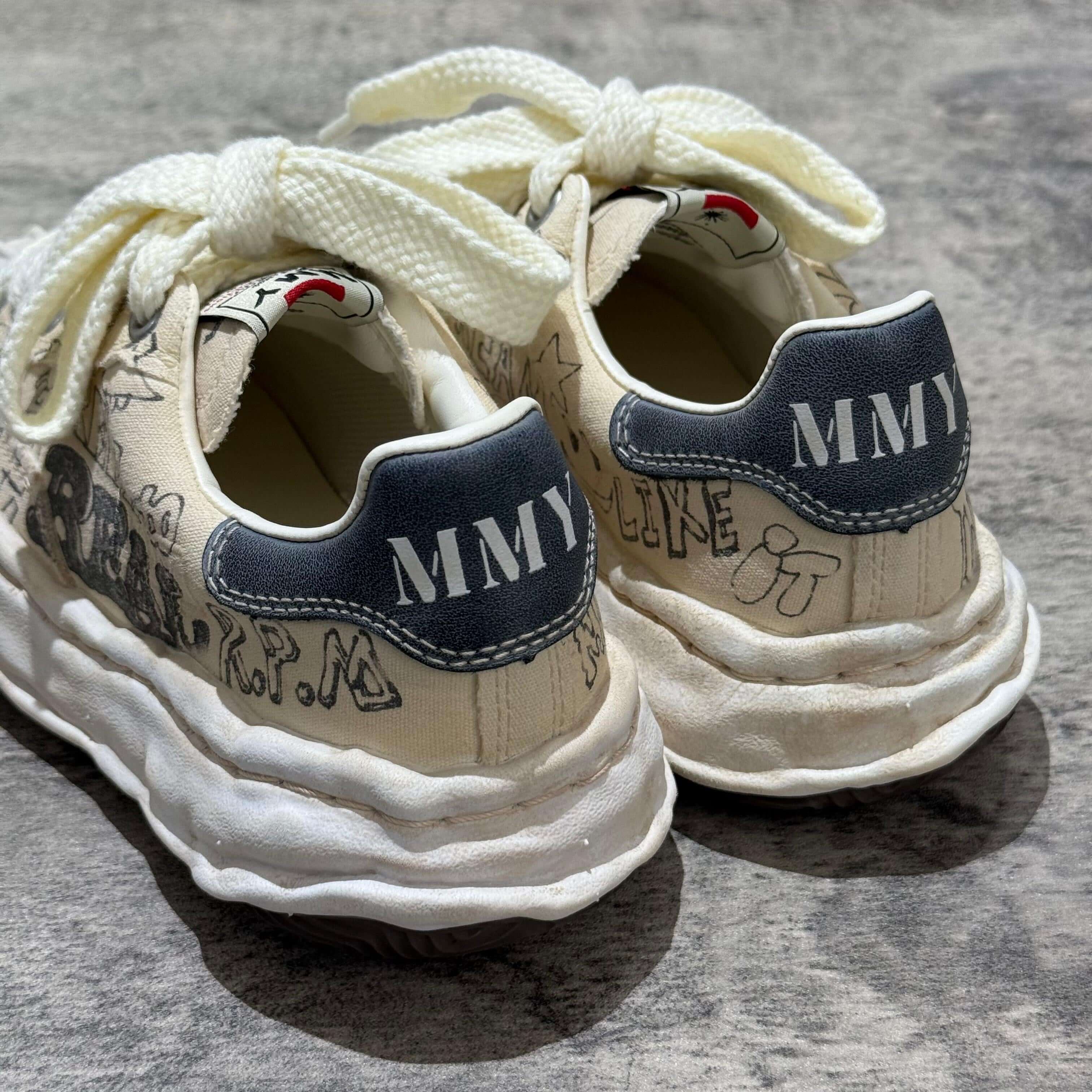 MMY BLAKEY Graffiti Printed Canvas Low sneakers showing the back design with unique graffiti art and distinctive branding.