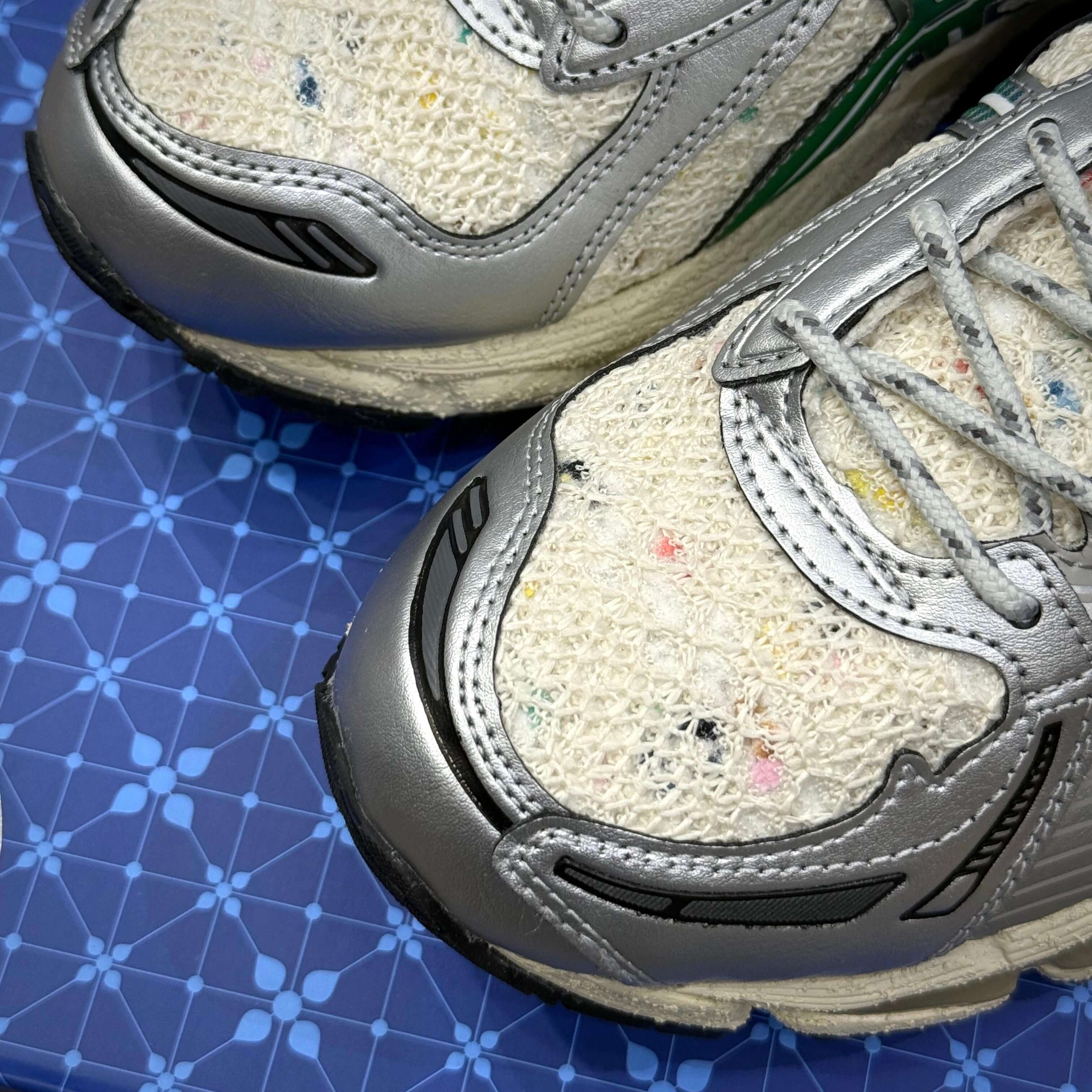 Top view of Carnival x Asics Gel Kayano 12.1 PHRA NAKHON sneakers showcasing unique design and colors.