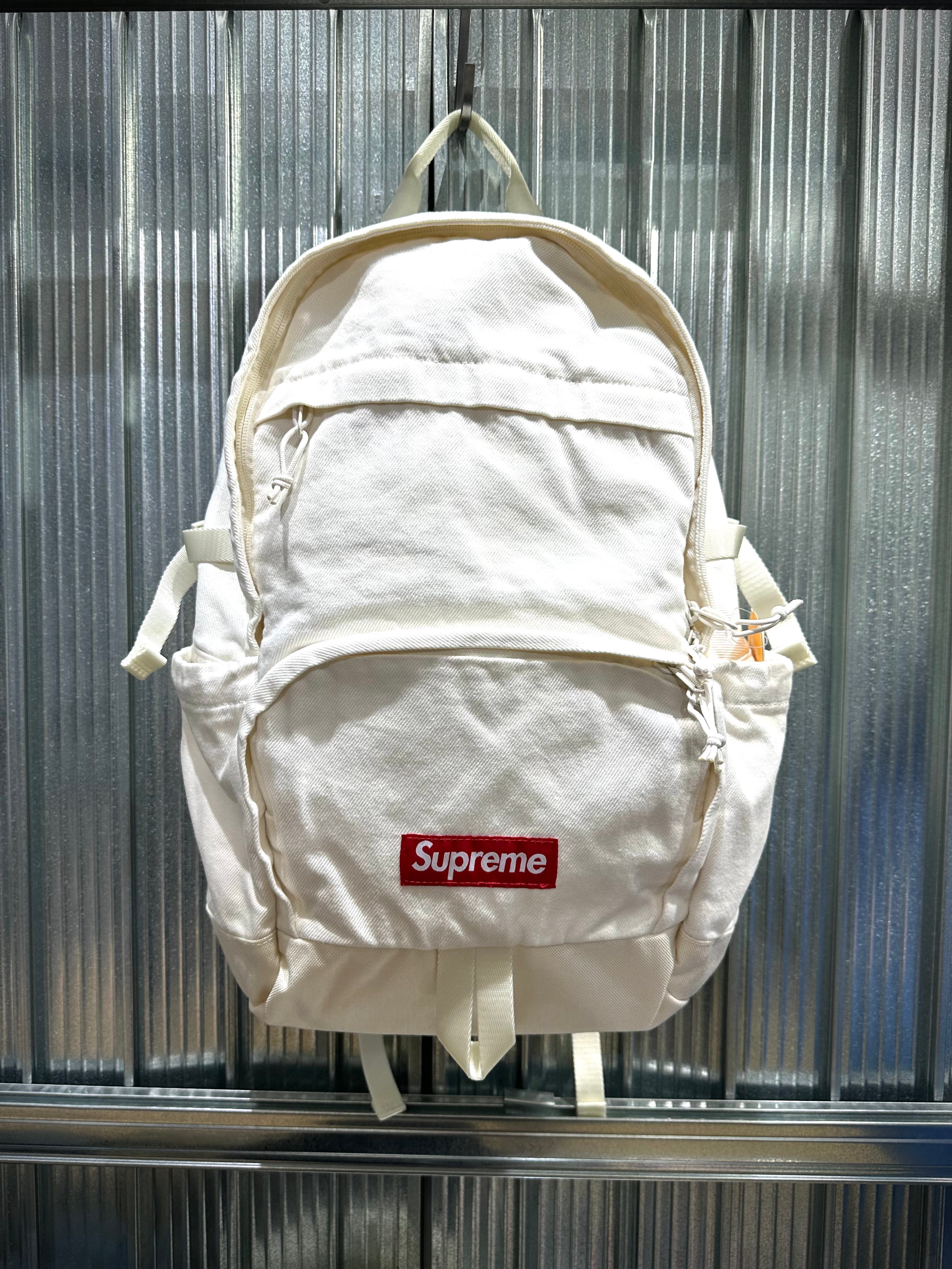 Supreme Denim Backpack FW25 washed indigo black realtree camo white